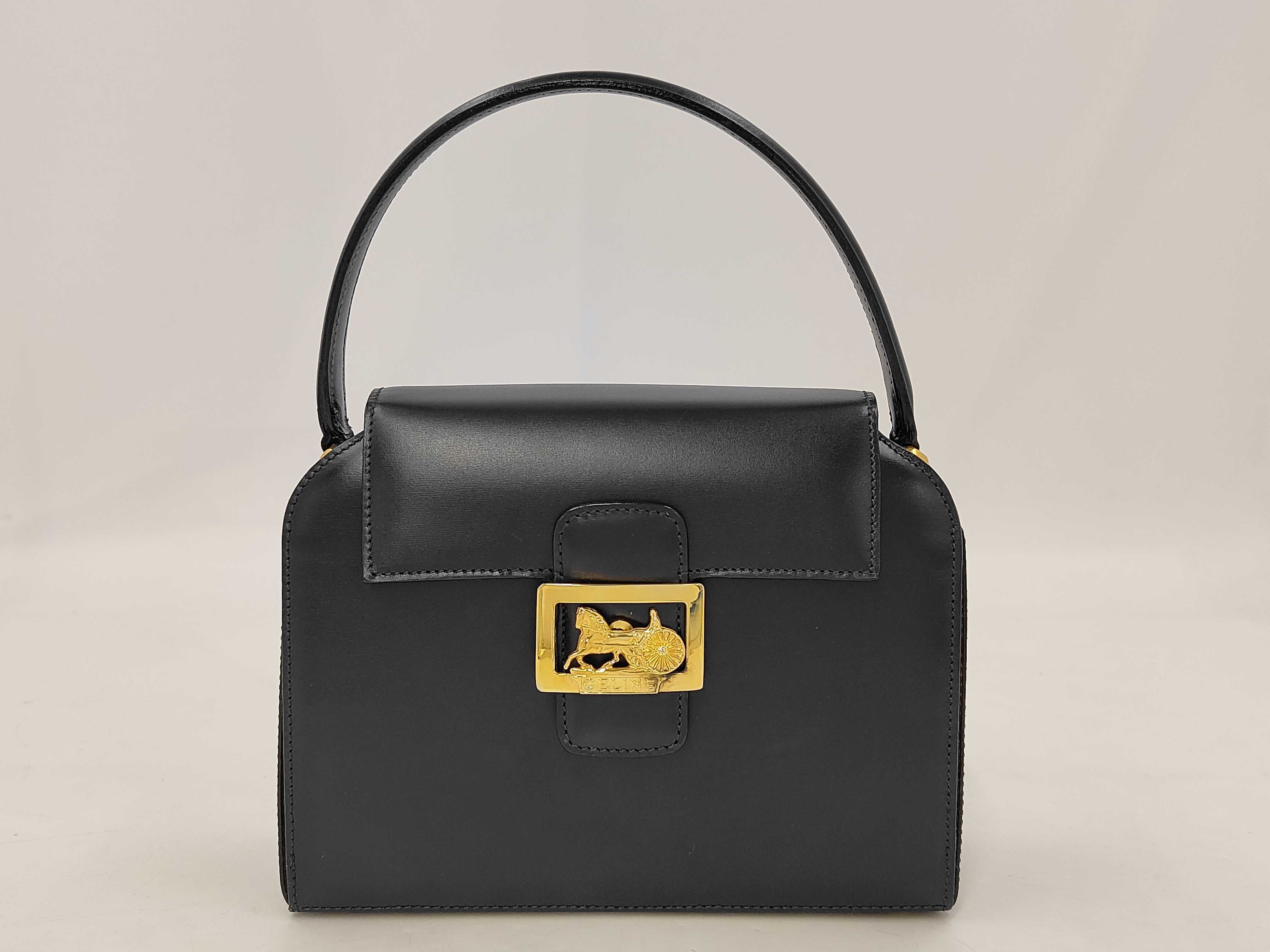 handbag, carriage hardware, black leather bag