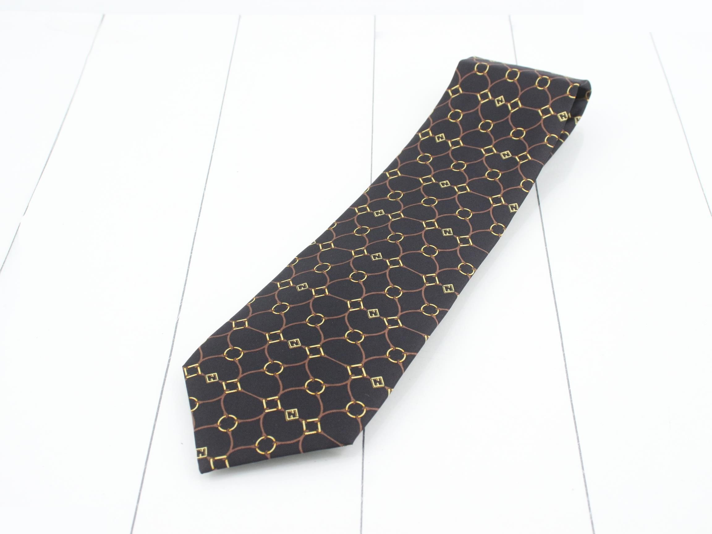 Unused Fendi Zucca tie with tags and dust bag.