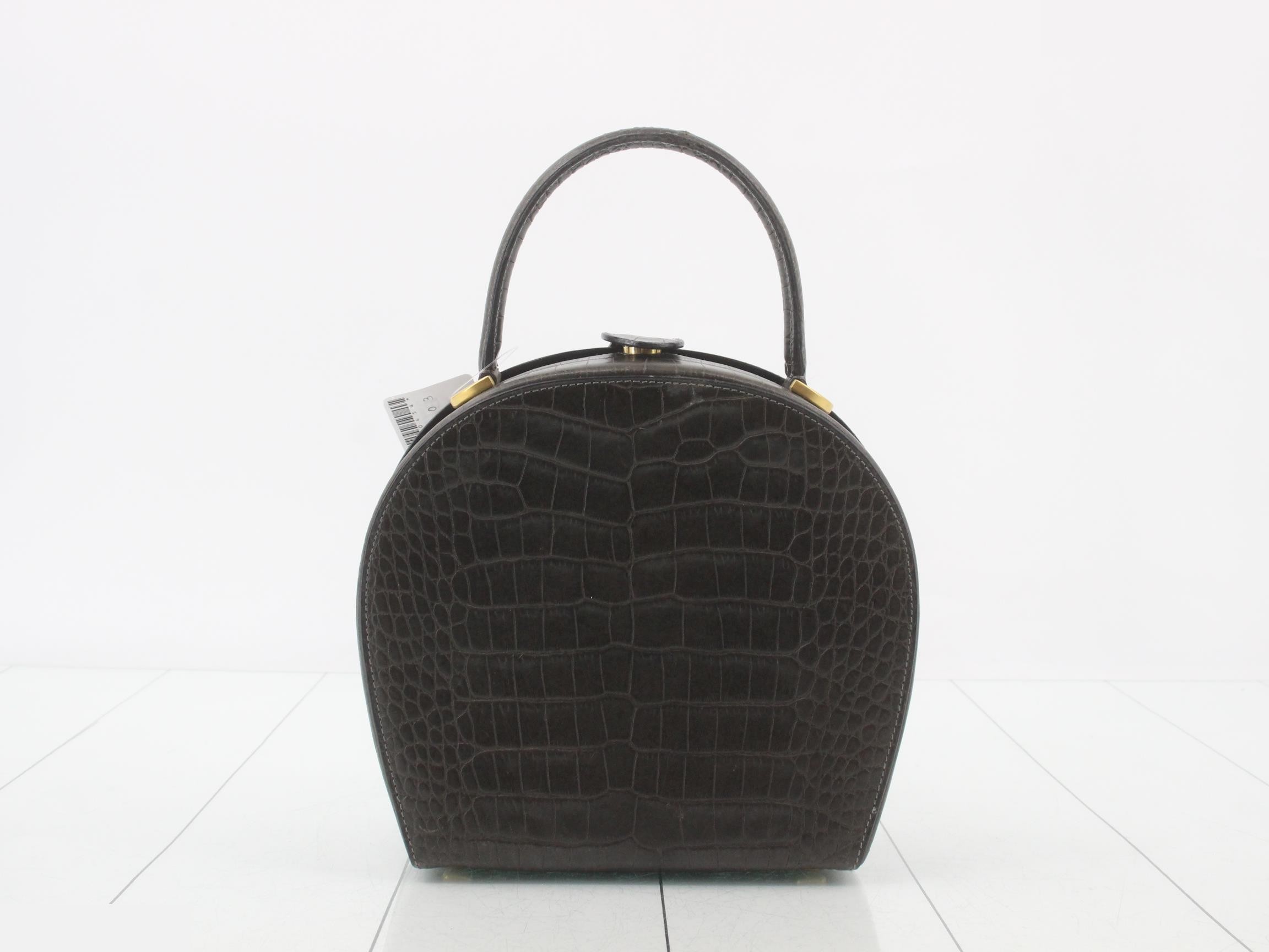 Crocodile embossed bags and handbags