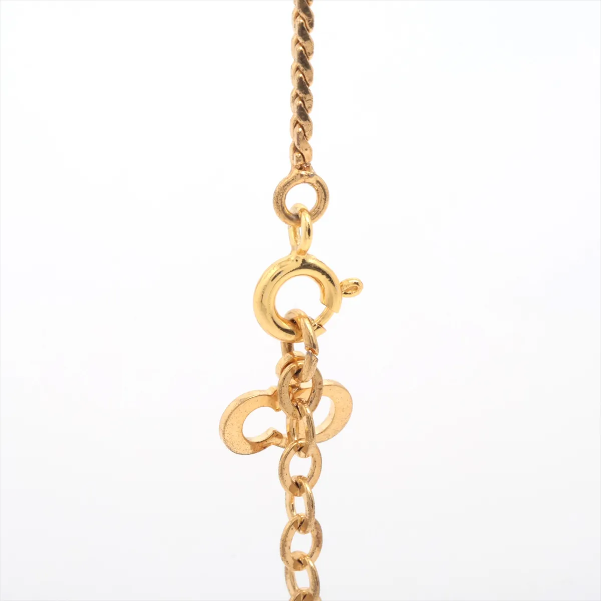 CD logo necklace, gold plated with rhinestones. Shows signs of wear, tarnishing, — view 3