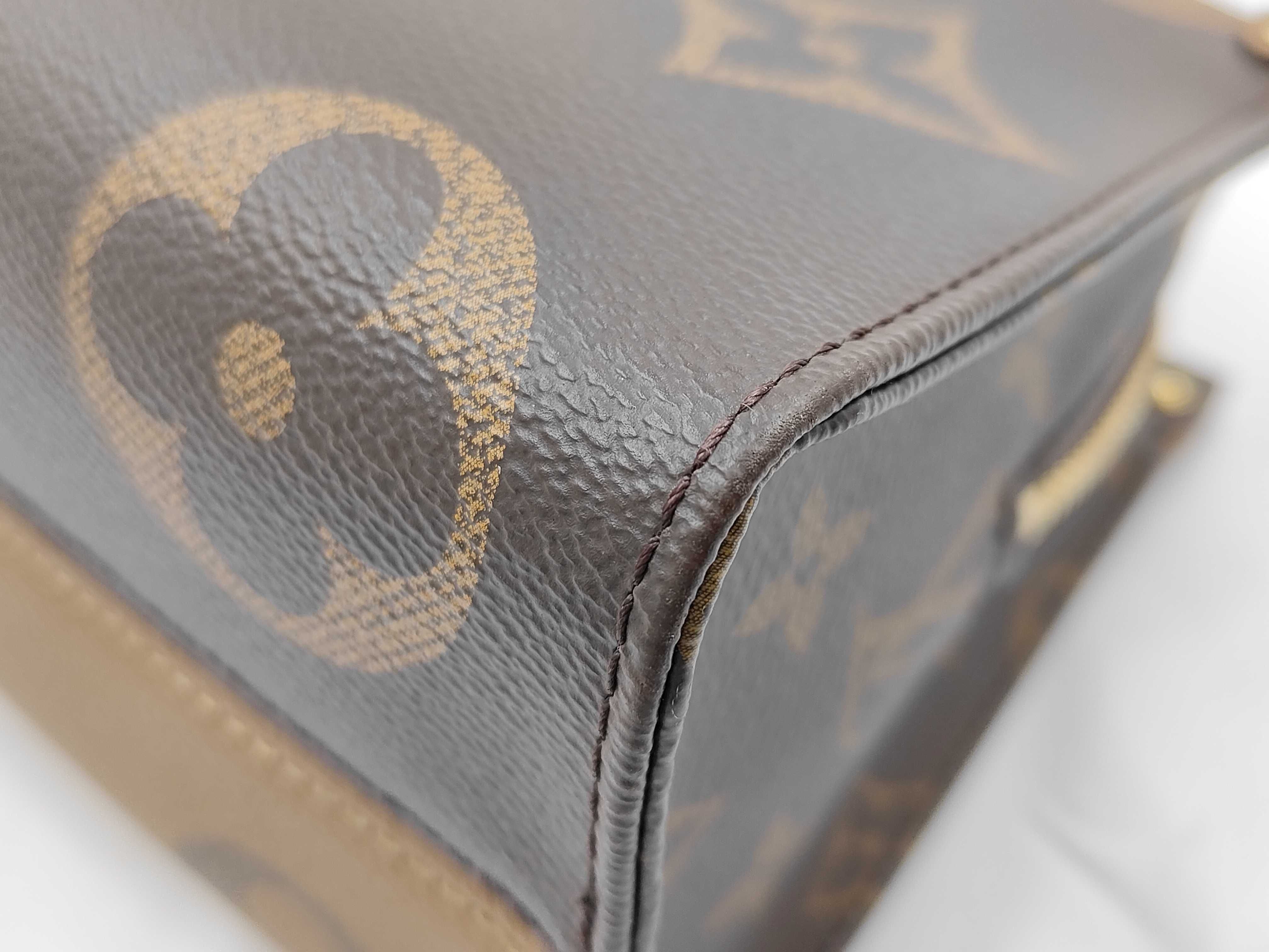Monogram Giant Reverse OnTheGo EW Handbag M46653 RFID Shoulder Strap — view 6