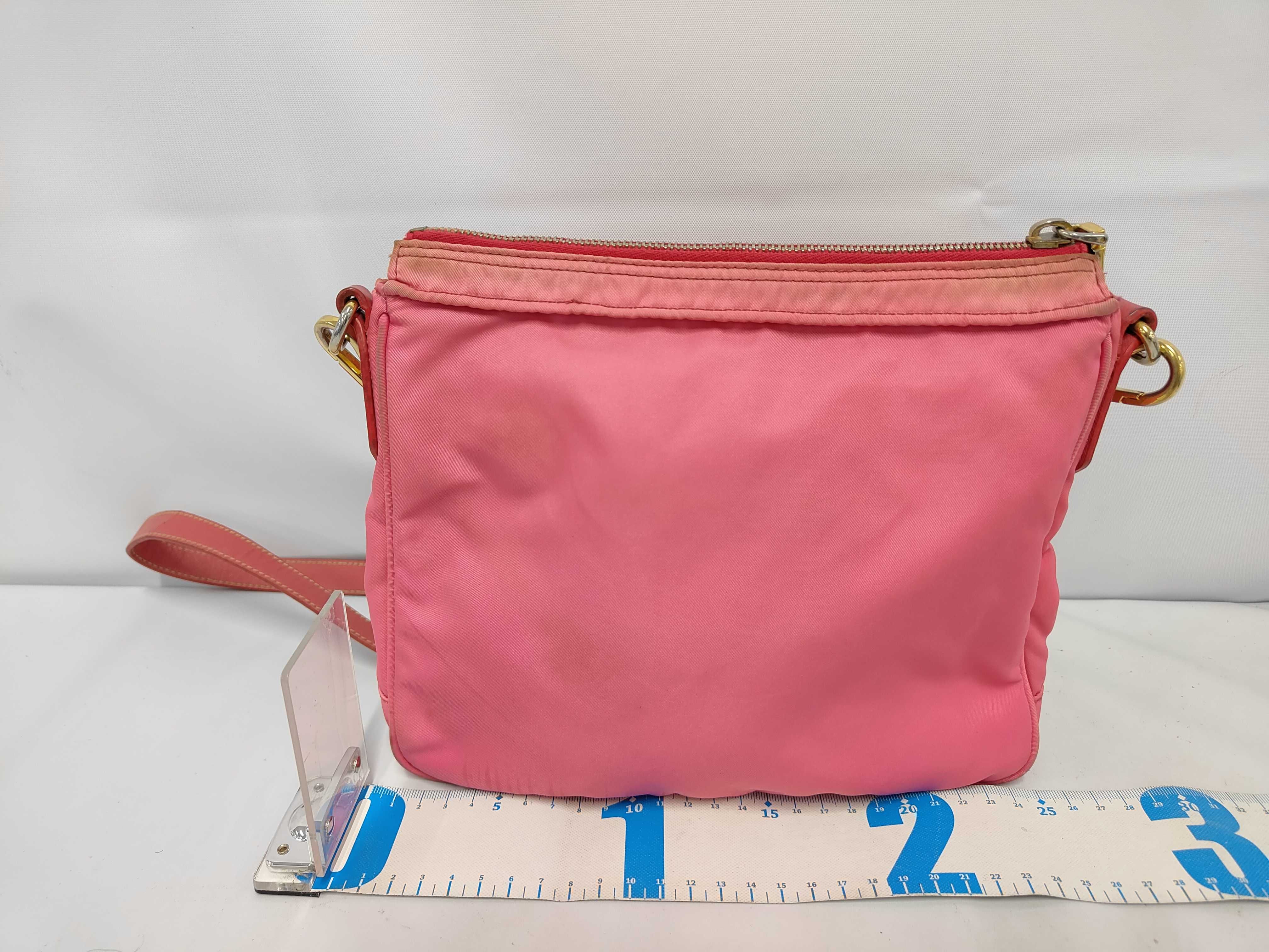 nylon shoulder bag with white tag. — view 2