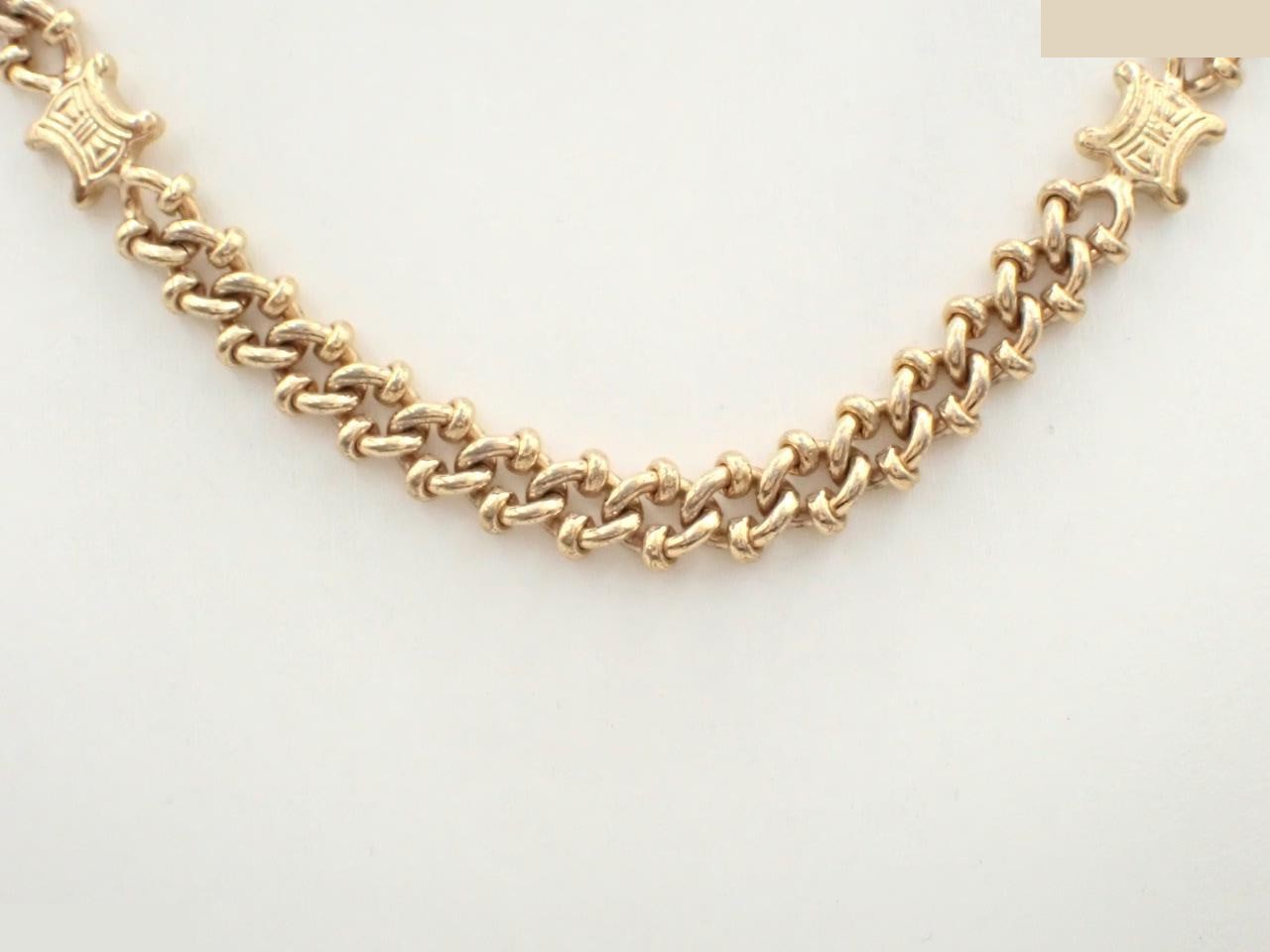 Other lines: Triomphe metal fittings, precious metals, necklaces, pendants