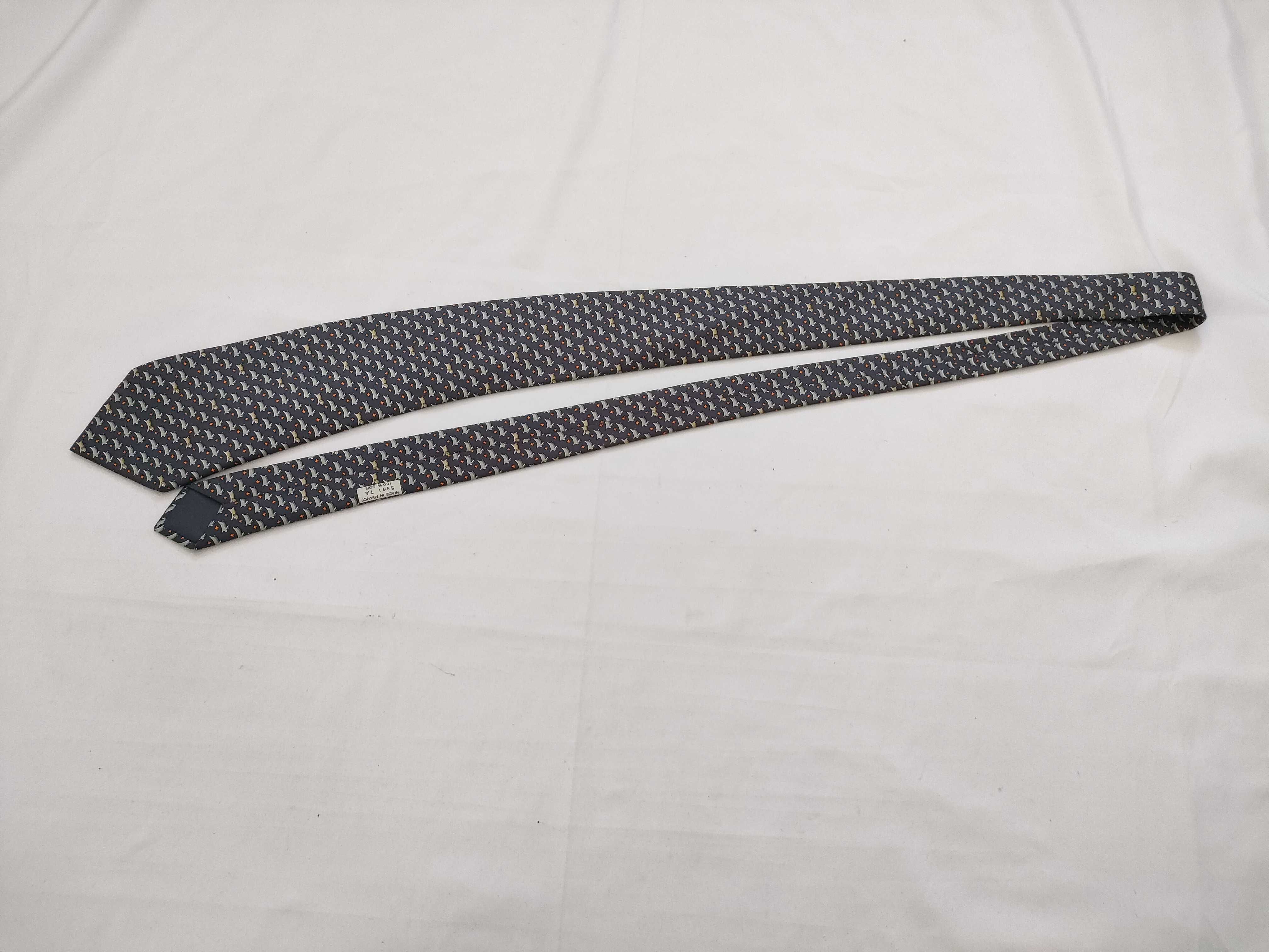 silk tie with animal print, navy blue, and other accessories. — view 2