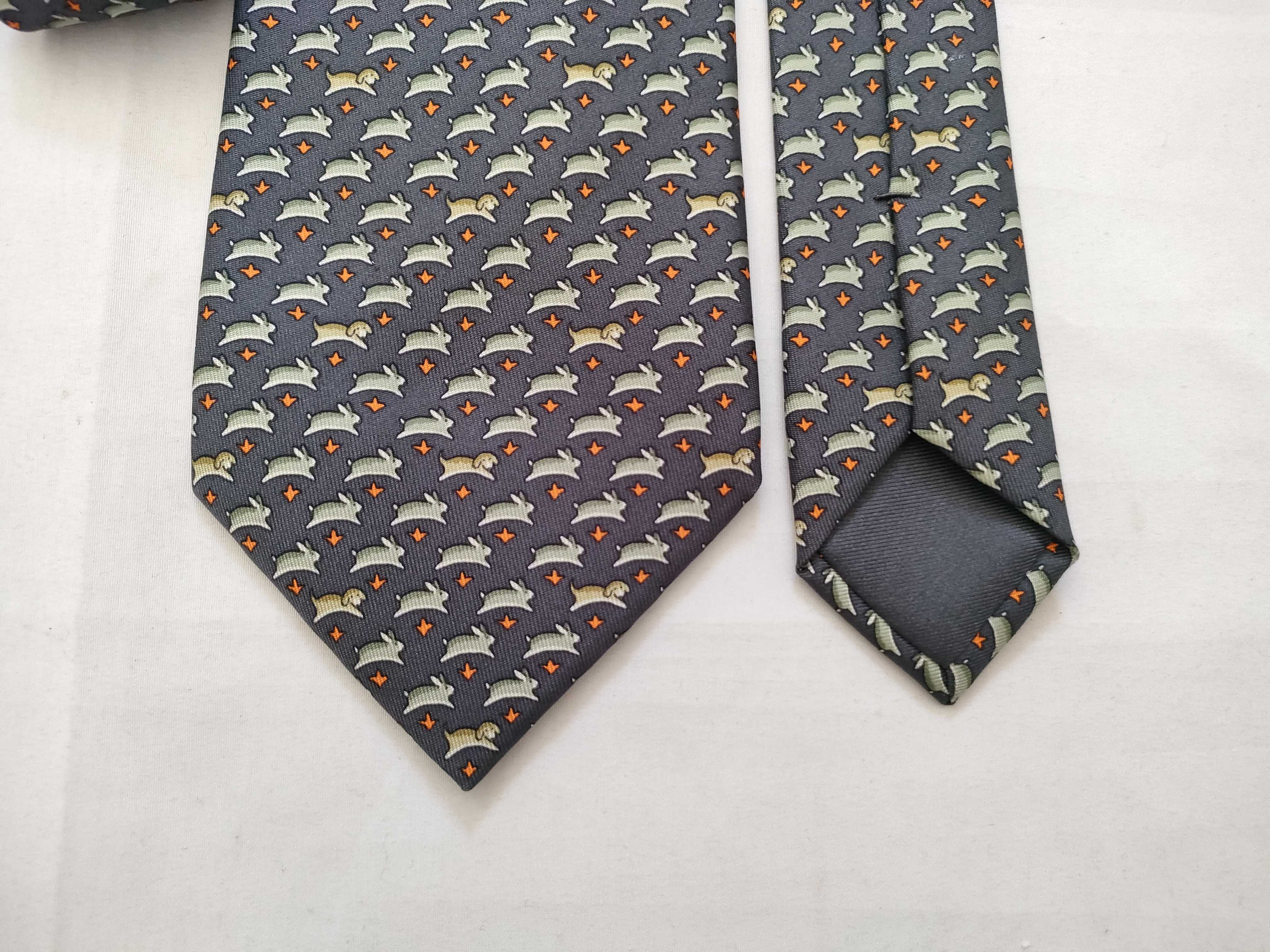 silk tie with animal print, navy blue, and other accessories. — view 4