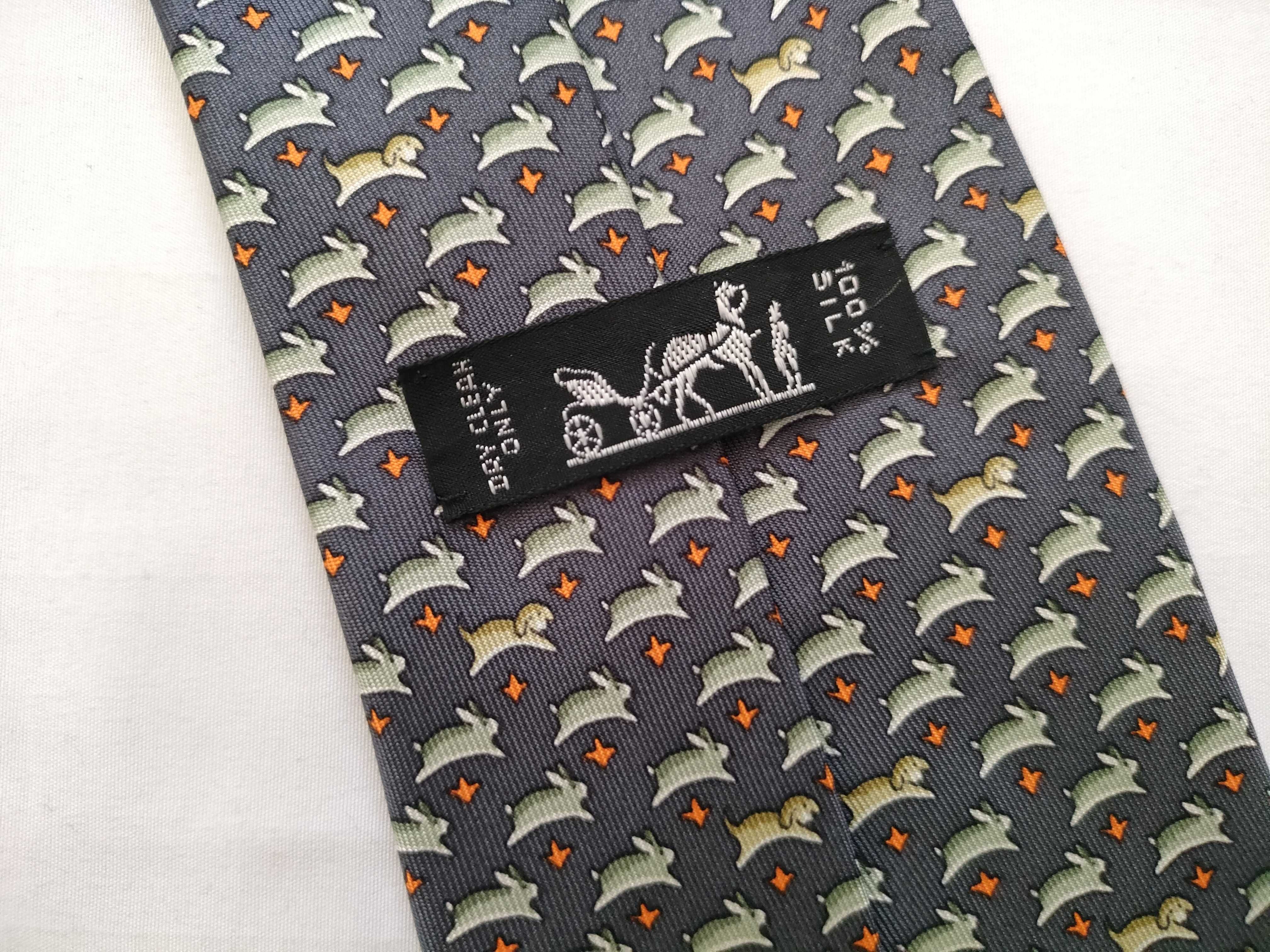 silk tie with animal print, navy blue, and other accessories. — view 8