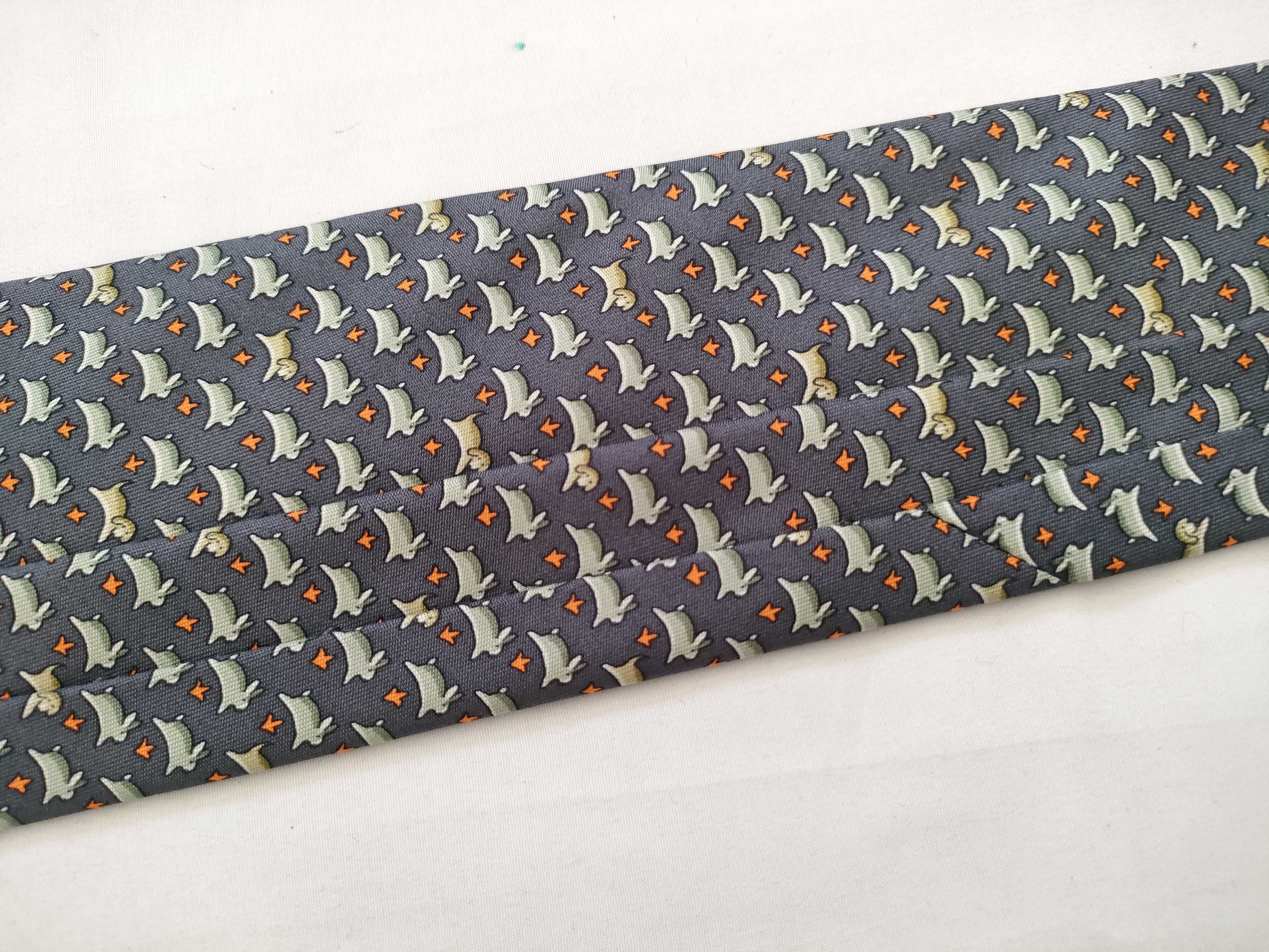 silk tie with animal print, navy blue, and other accessories. — view 9