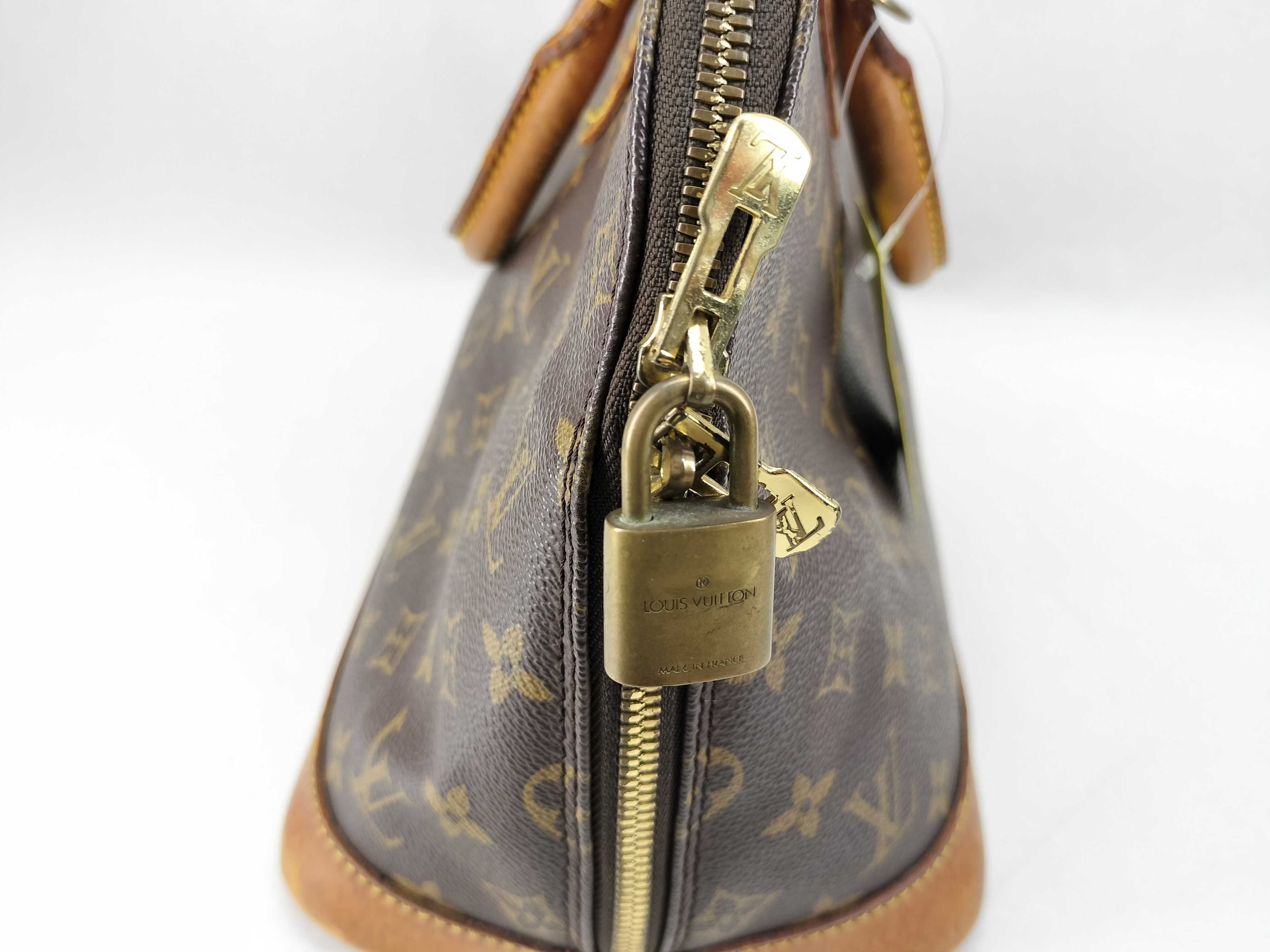 Monogram M51130 Alma Handbag with Padlock — view 11