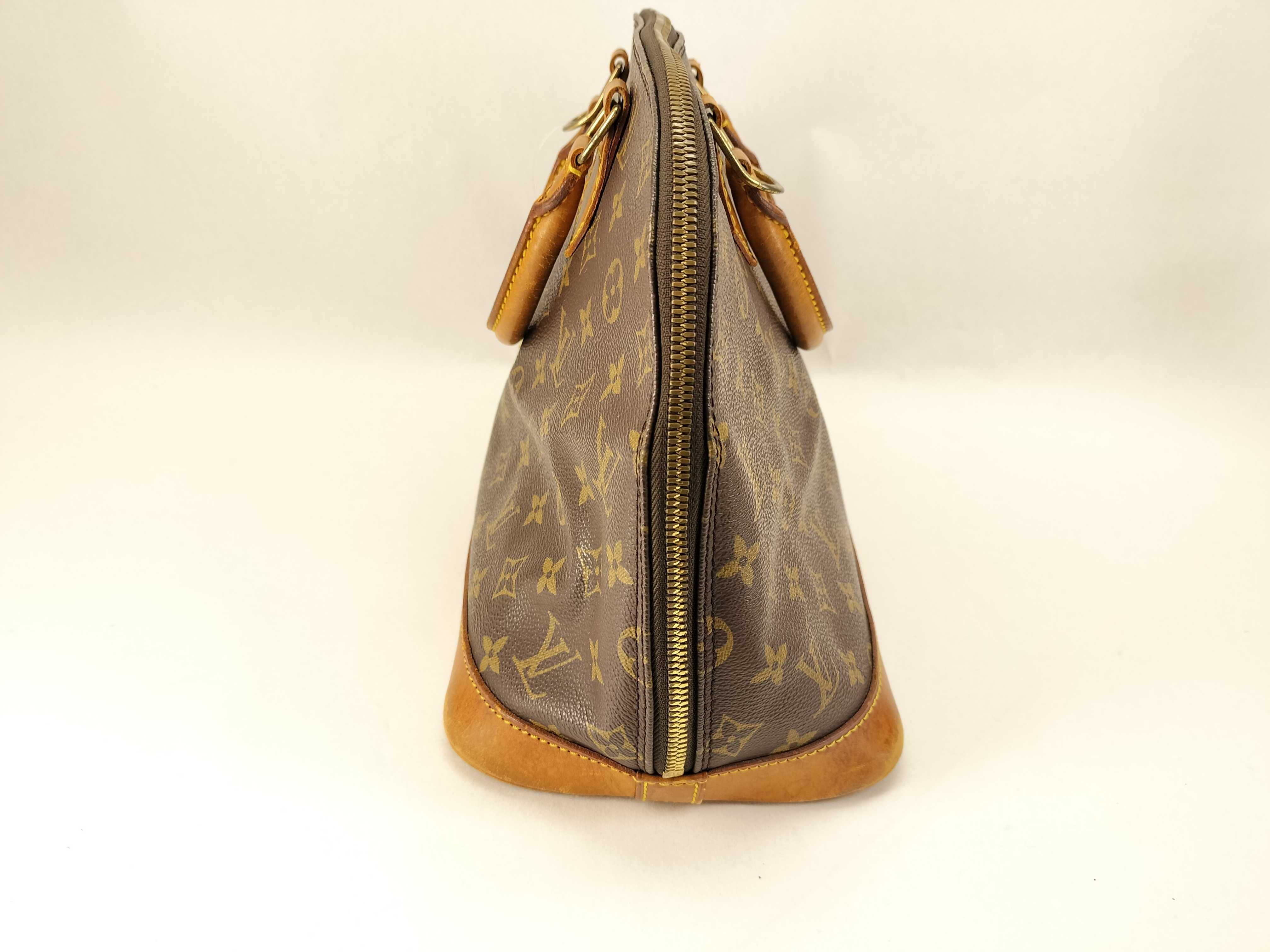Monogram M51130 Alma Handbag with Padlock — view 9