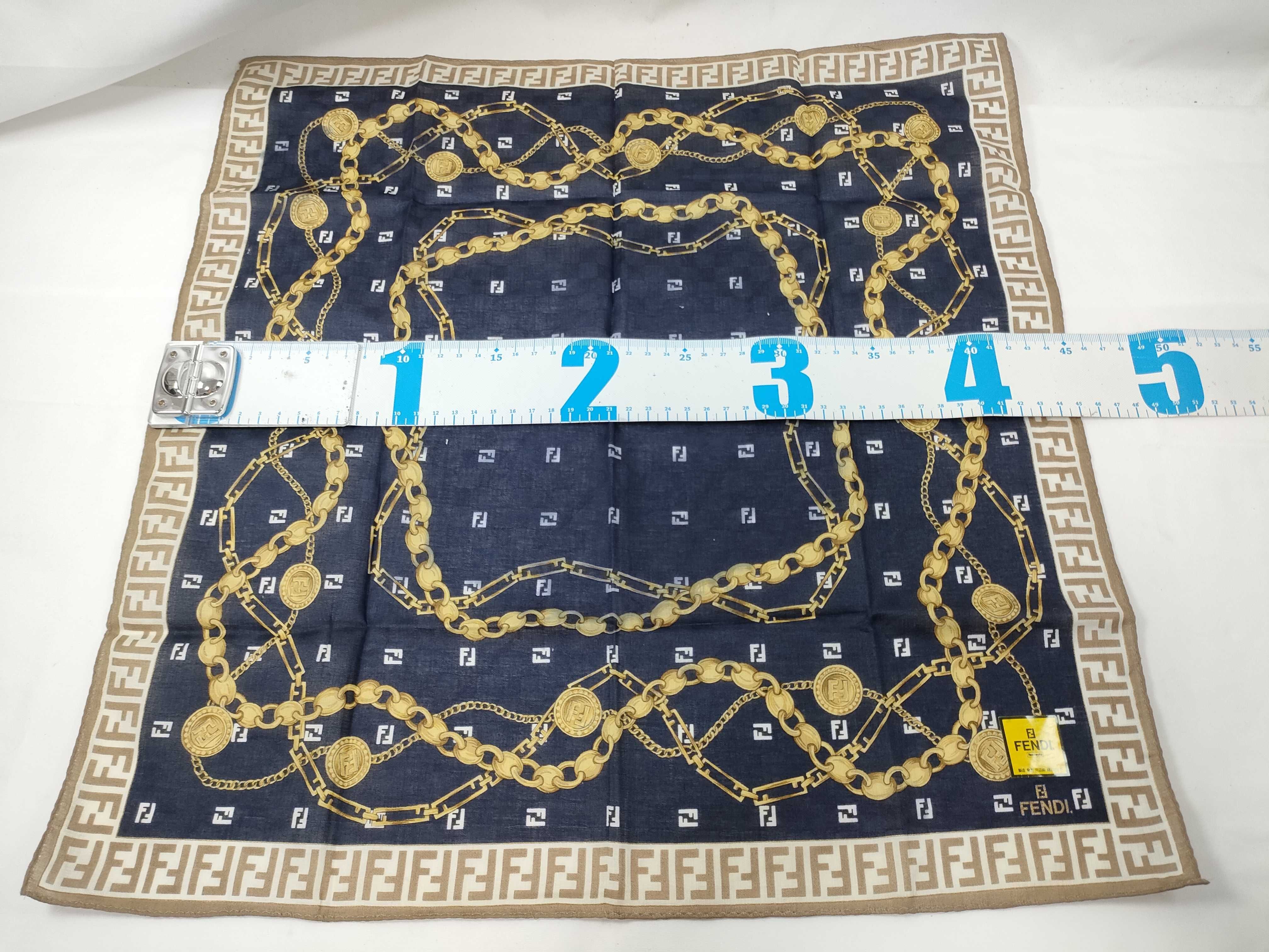 handkerchief scarf with sticker, border logo, FF Zucca pattern, chain, coin, and other accessories. — view 2