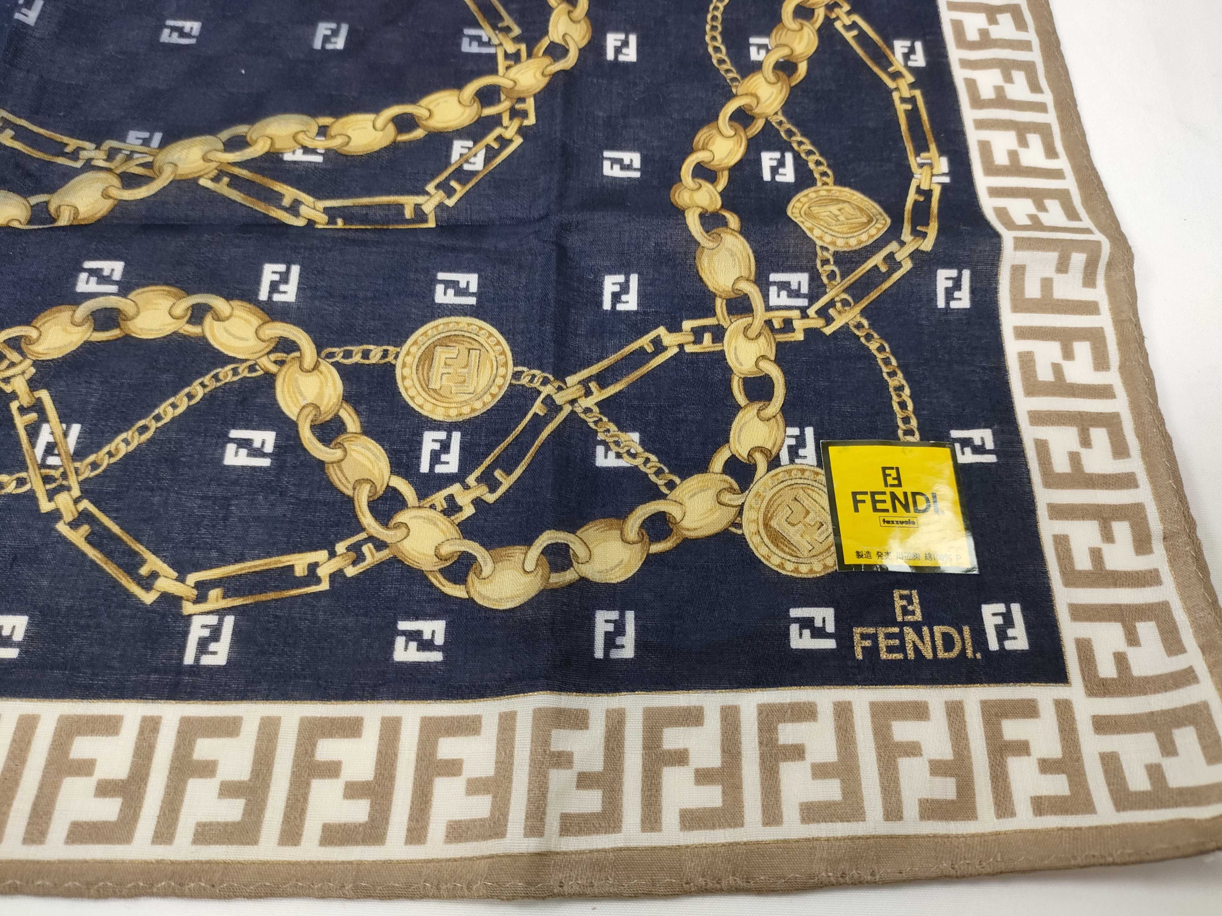 handkerchief scarf with sticker, border logo, FF Zucca pattern, chain, coin, and other accessories. — view 6