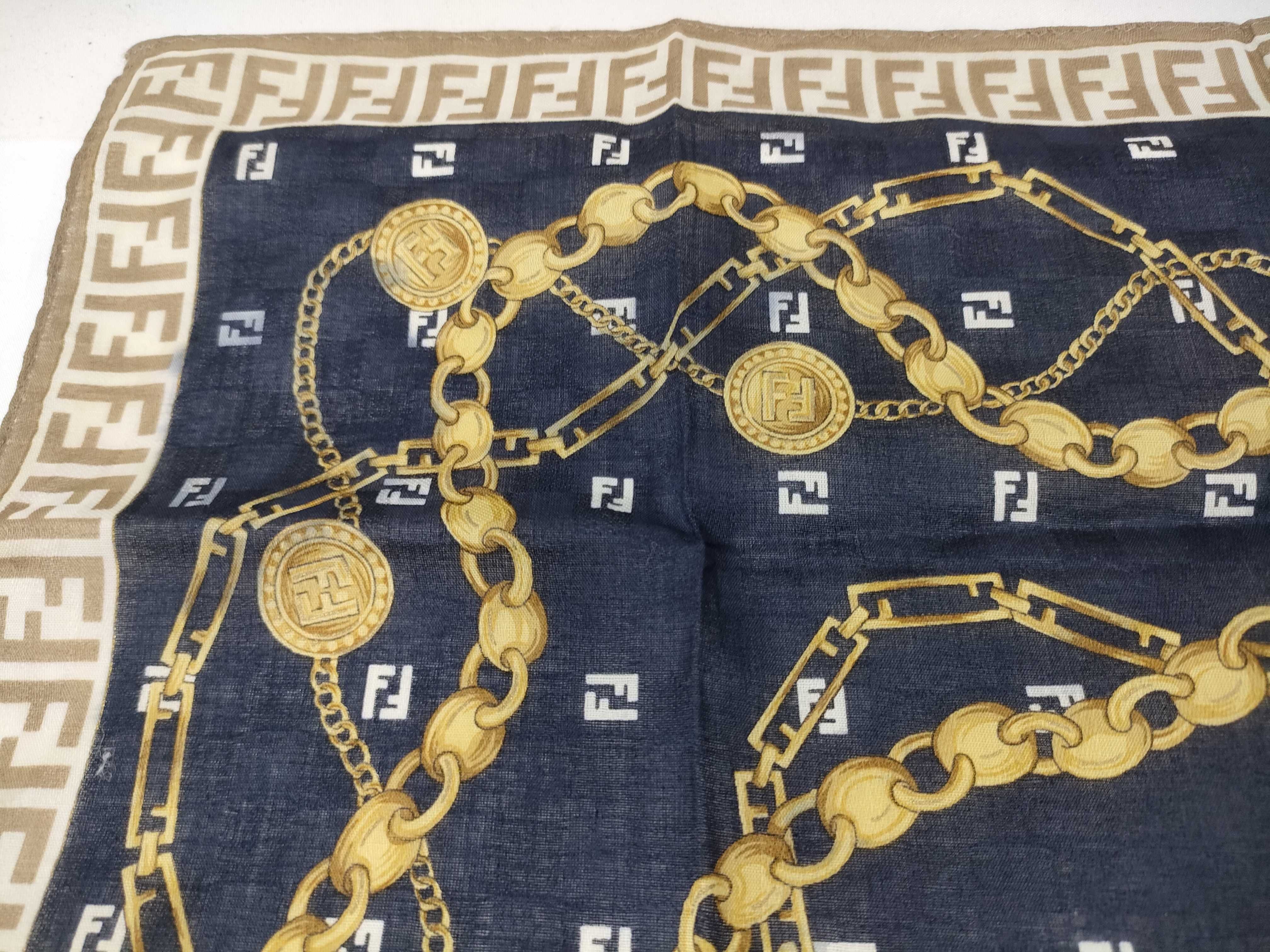 handkerchief scarf with sticker, border logo, FF Zucca pattern, chain, coin, and other accessories. — view 7