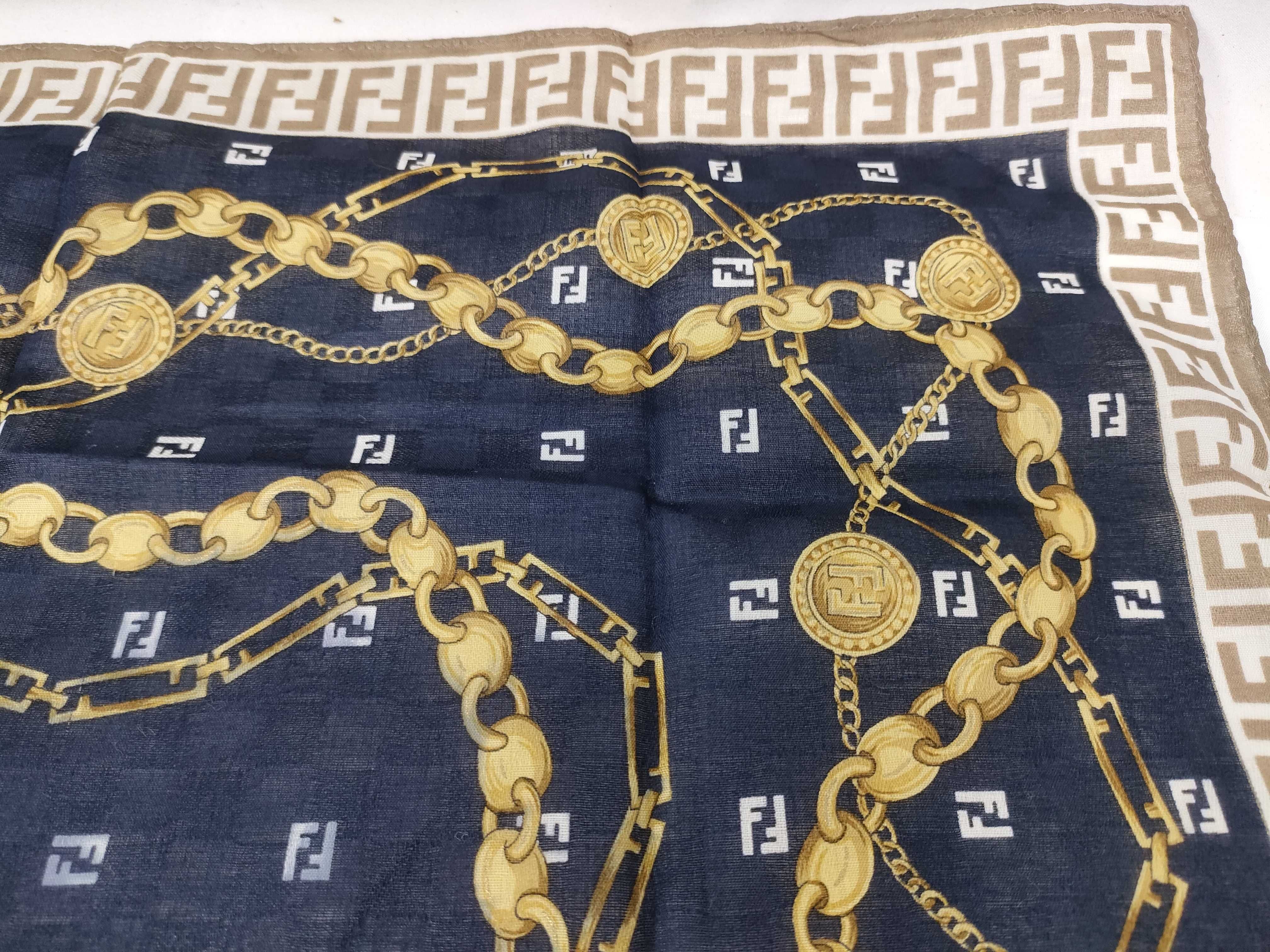 handkerchief scarf with sticker, border logo, FF Zucca pattern, chain, coin, and other accessories. — view 9