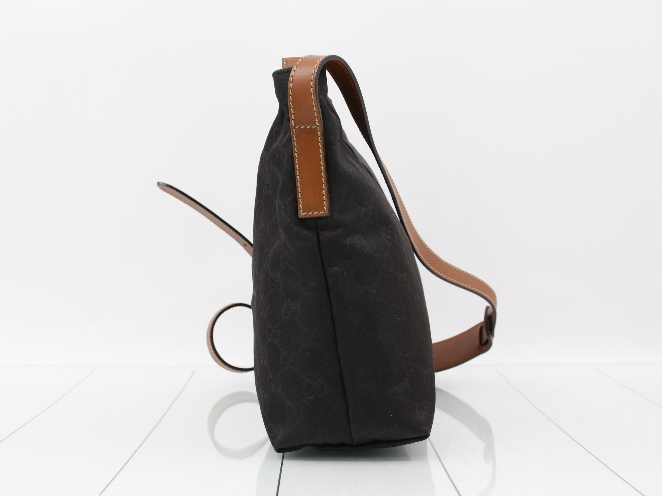 Nylon and leather shoulder bag with GG pattern. — view 3