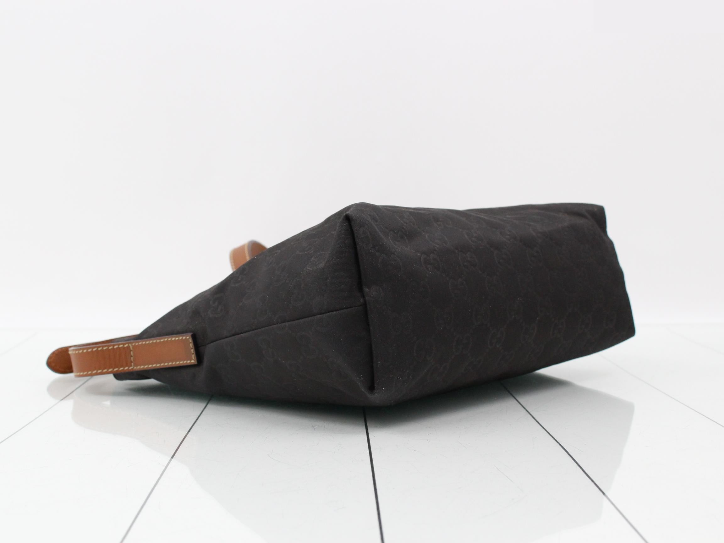 Nylon and leather shoulder bag with GG pattern. — view 5