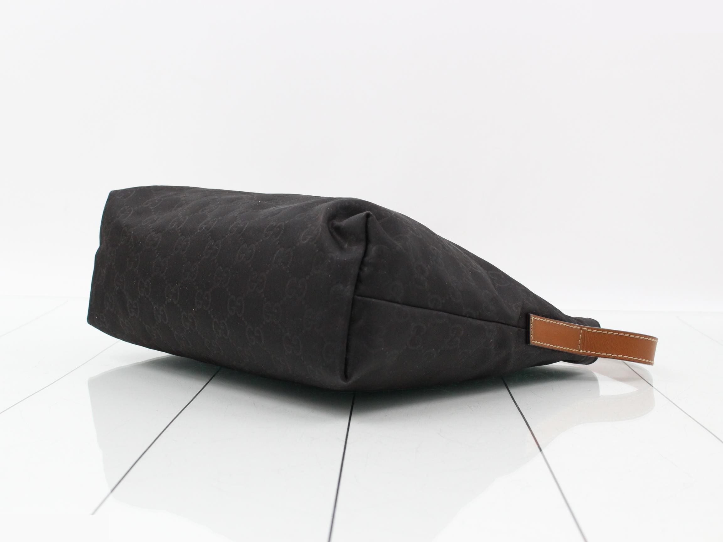 Nylon and leather shoulder bag with GG pattern. — view 6
