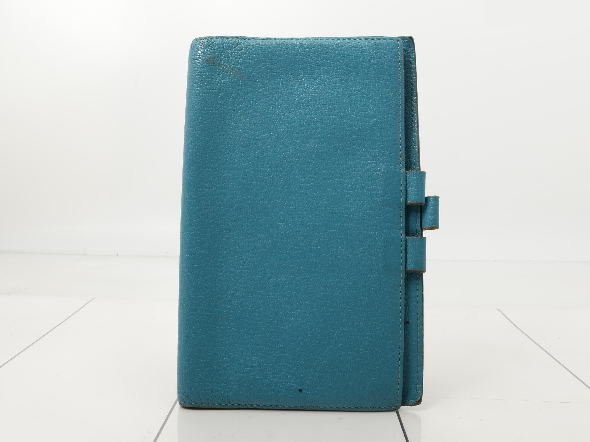 Leather notebook cover with Q stamp