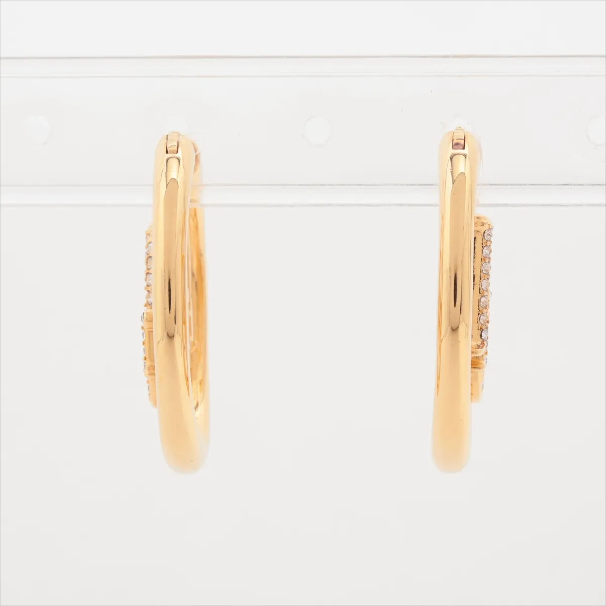 hoop earrings, gold-plated with rhinestones, show signs of wear, tarnishing, and — view 2