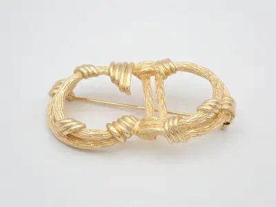 CD logo, gold, GP, 5.7cm wide