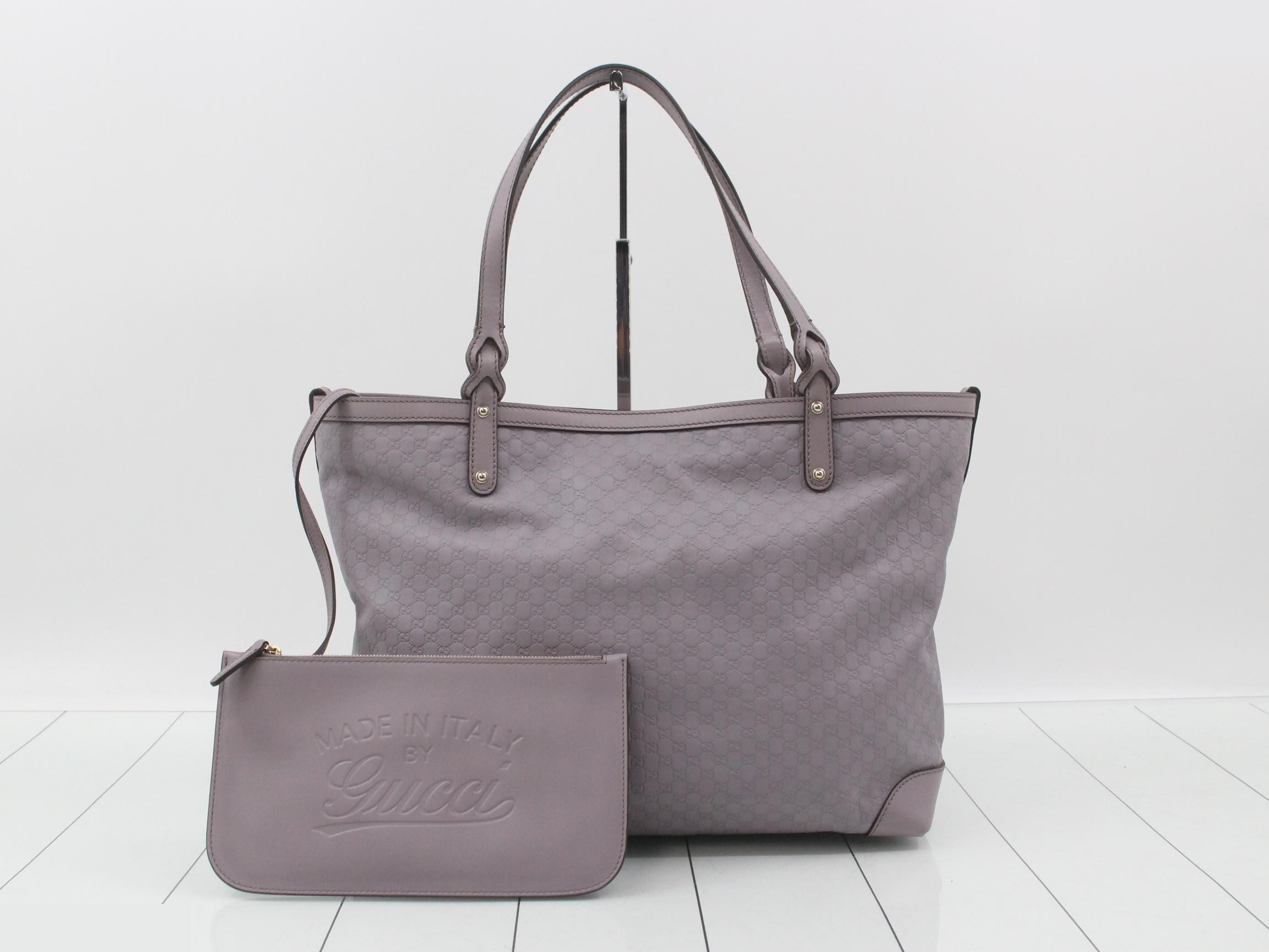 Microguccissima leather tote bag with pouch, purple tones.
