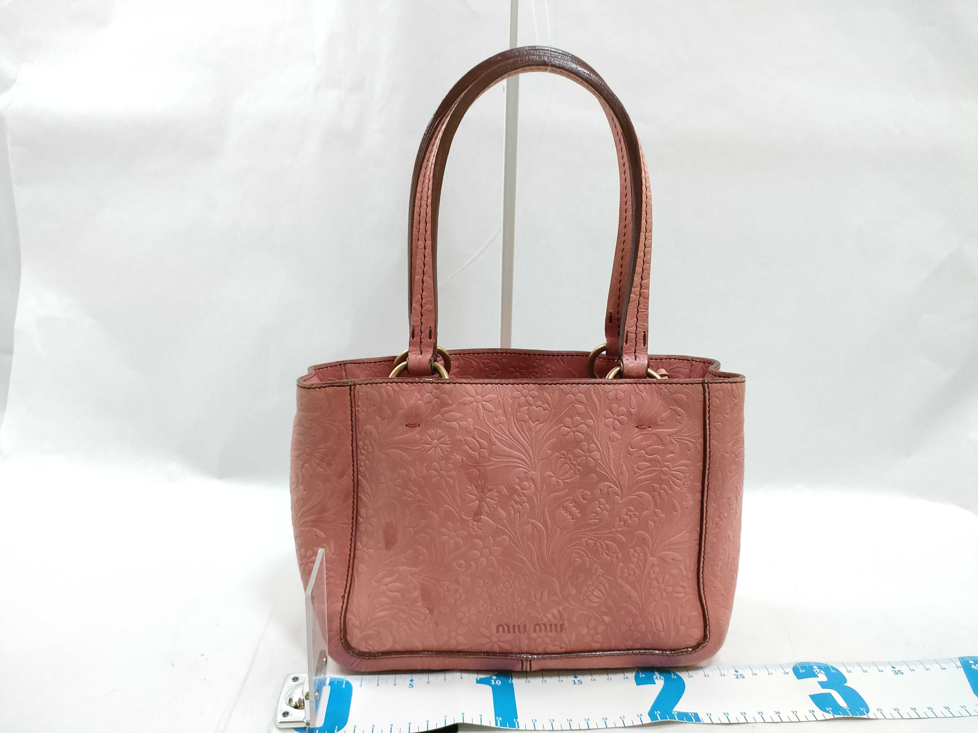 handbag, floral print, embossed logo, leather, tag. — view 2