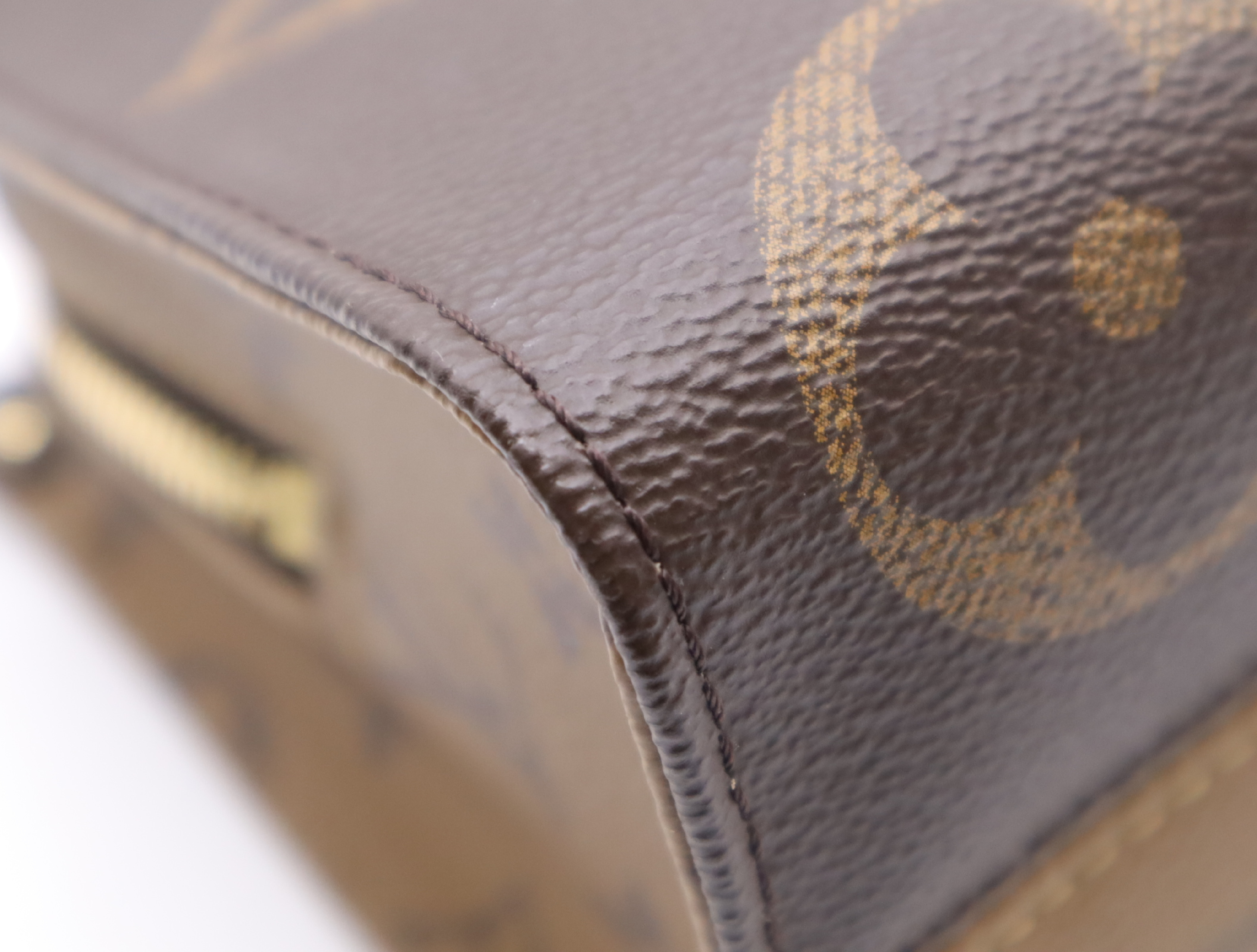 M46653 Monogram Giant Reverse OnTheGo EW Handbag with Shoulder Strap, Coin Case, Dust Bag, and Box — view 6
