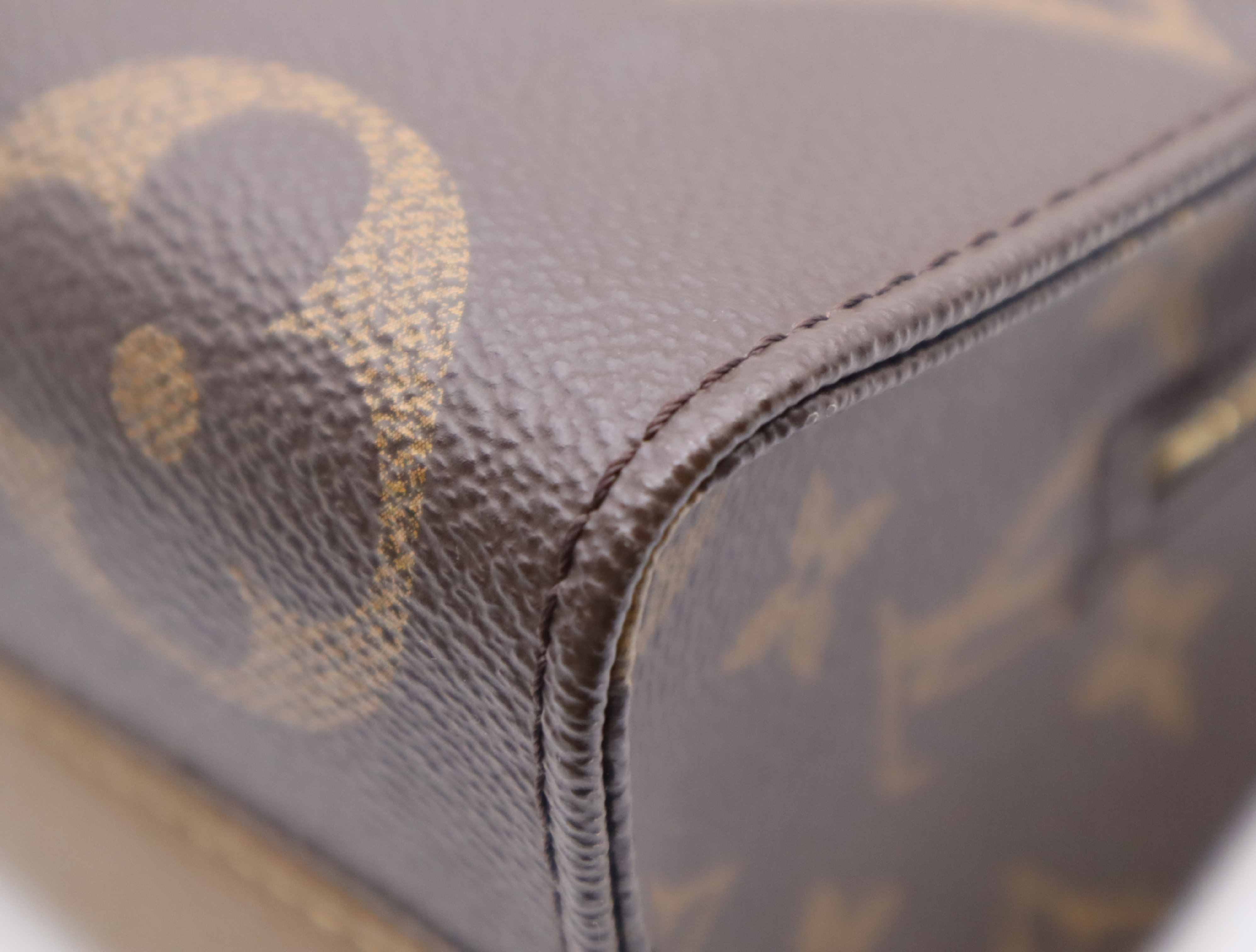 M46653 Monogram Giant Reverse OnTheGo EW Handbag with Shoulder Strap, Coin Case, Dust Bag, and Box — view 7