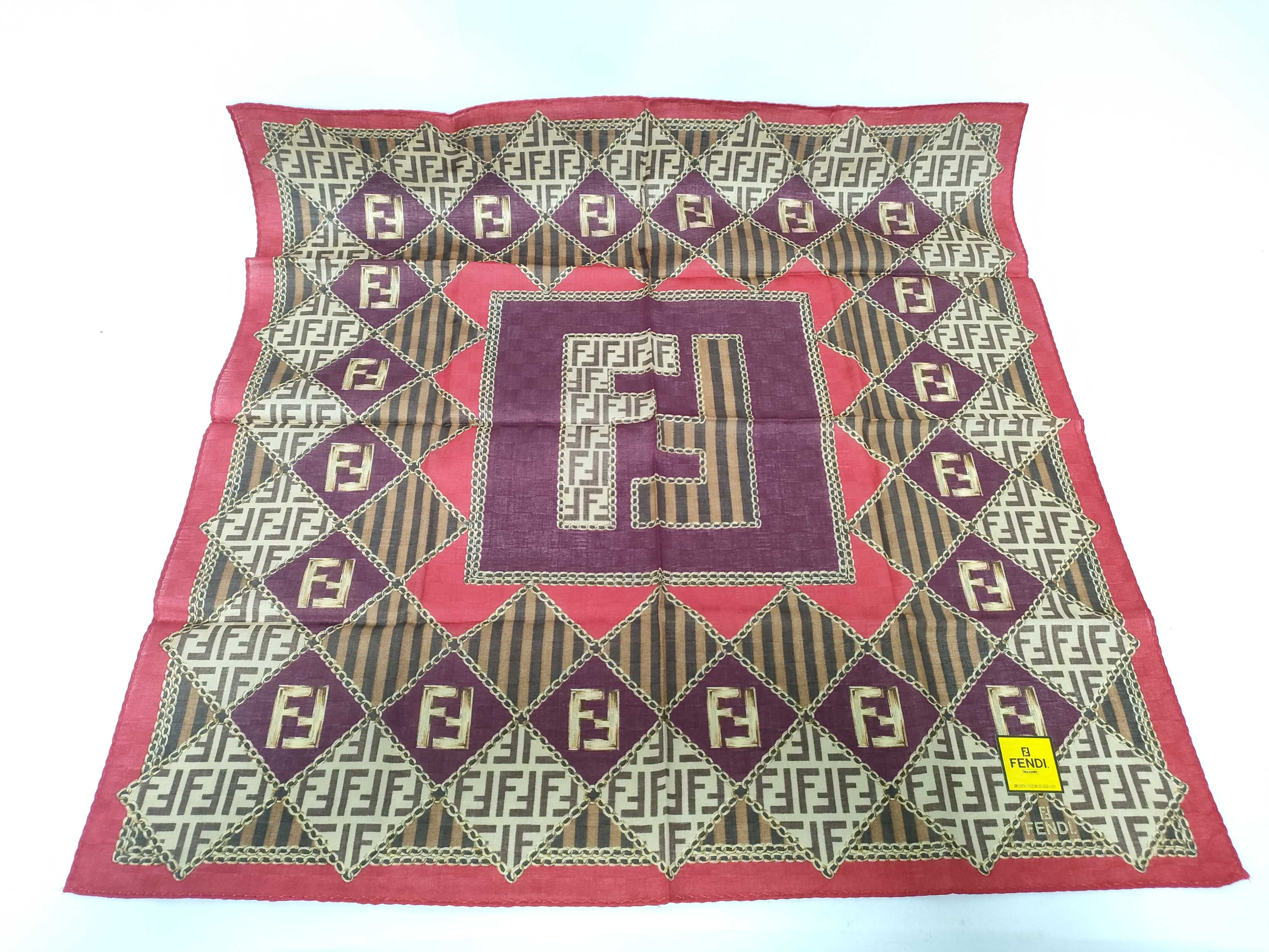 handkerchief scarf with sticker, FF all-over print, Zucca pattern, chain, and other accessories.