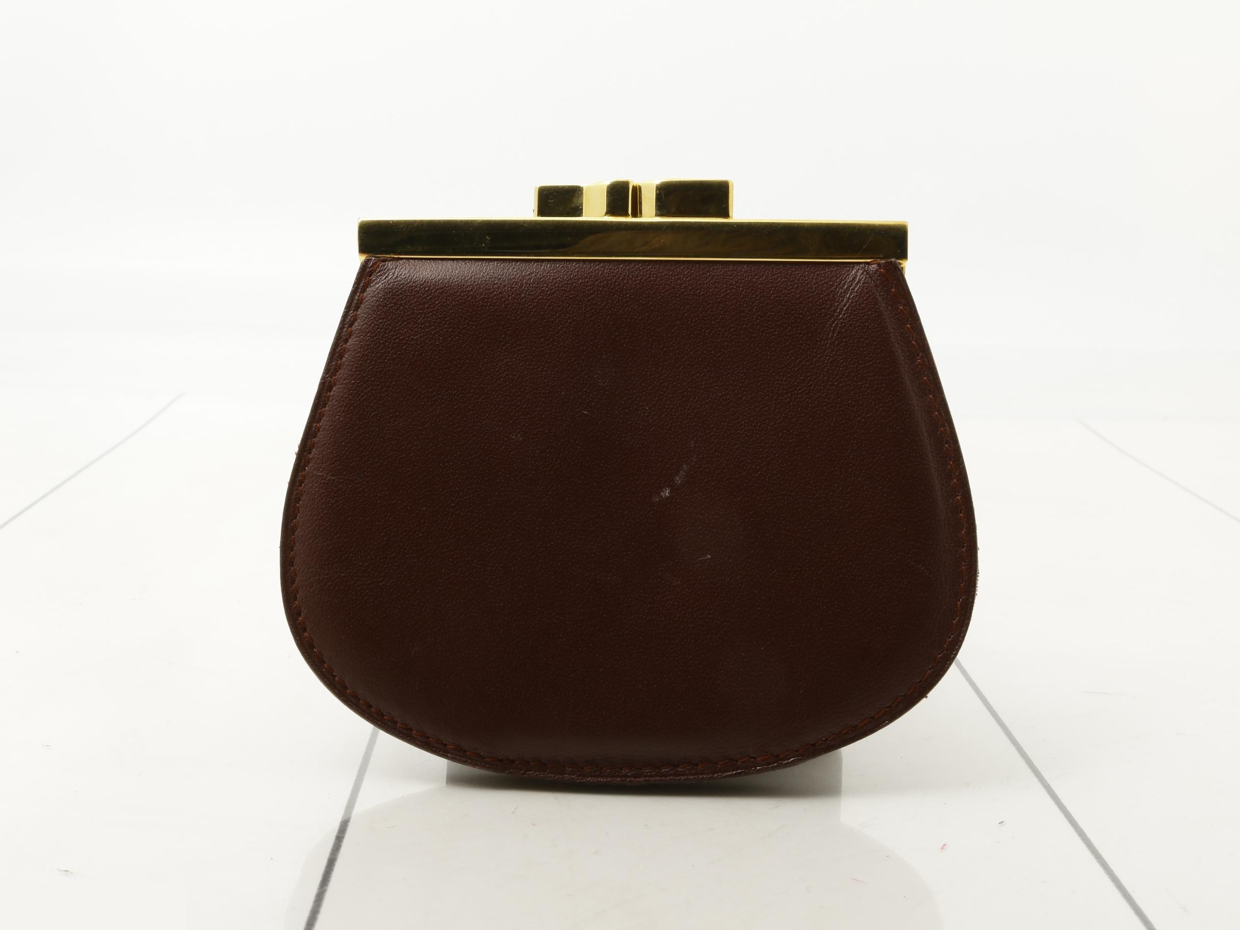 A coin purse is a must-have. — view 2