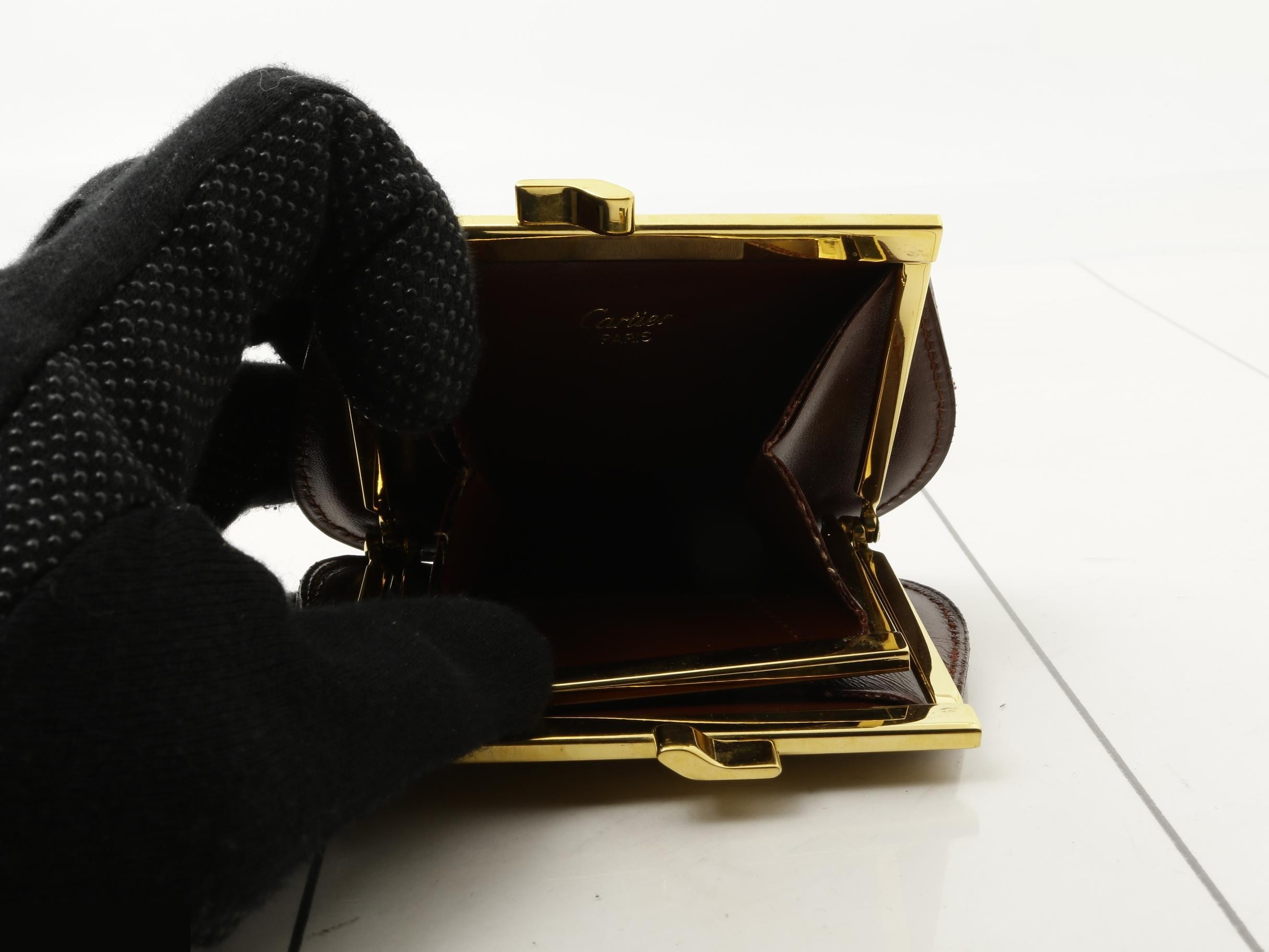 A coin purse is a must-have. — view 4