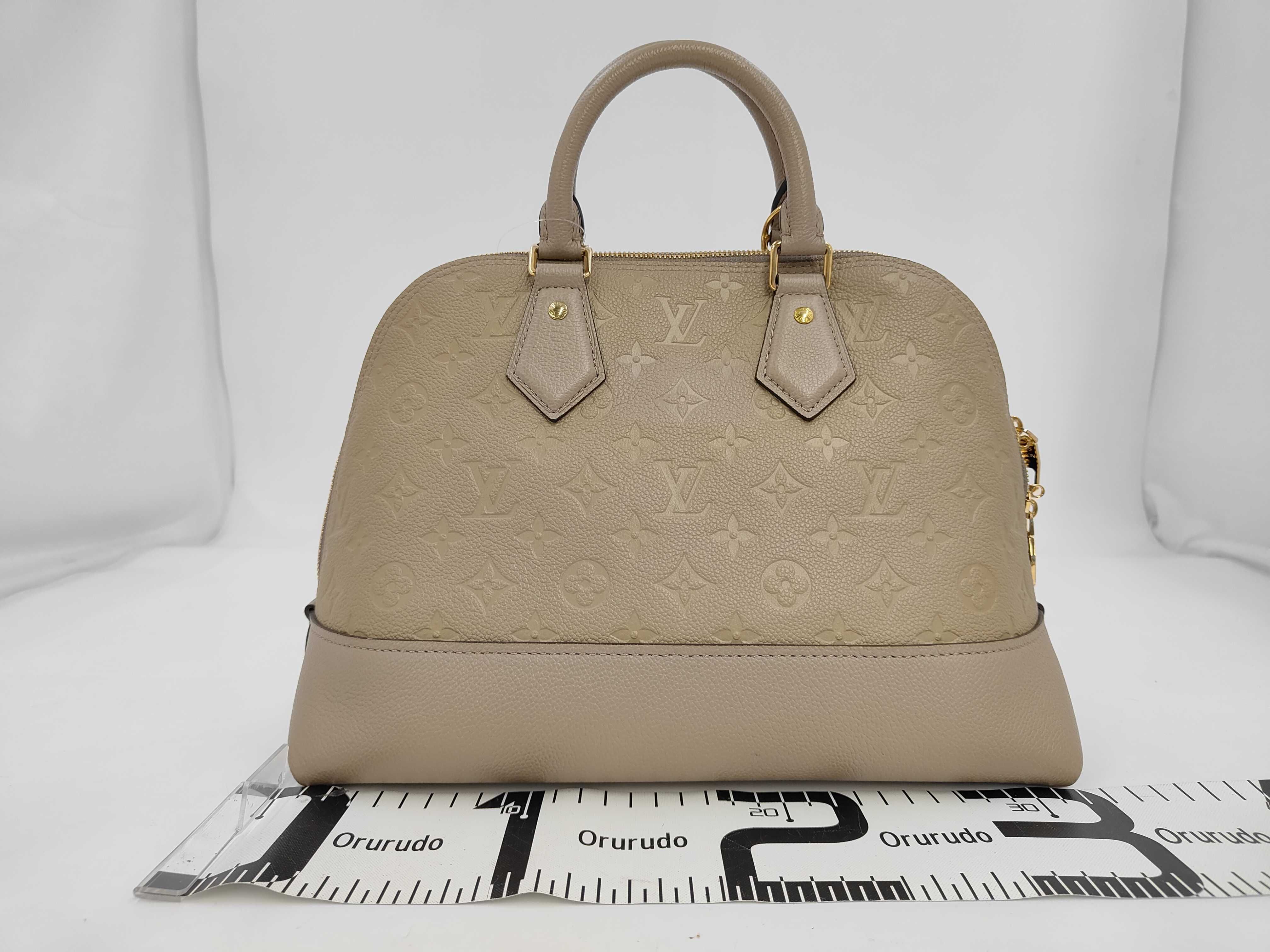 Monogram Empreinte Alma PM Cream Handbag — view 2