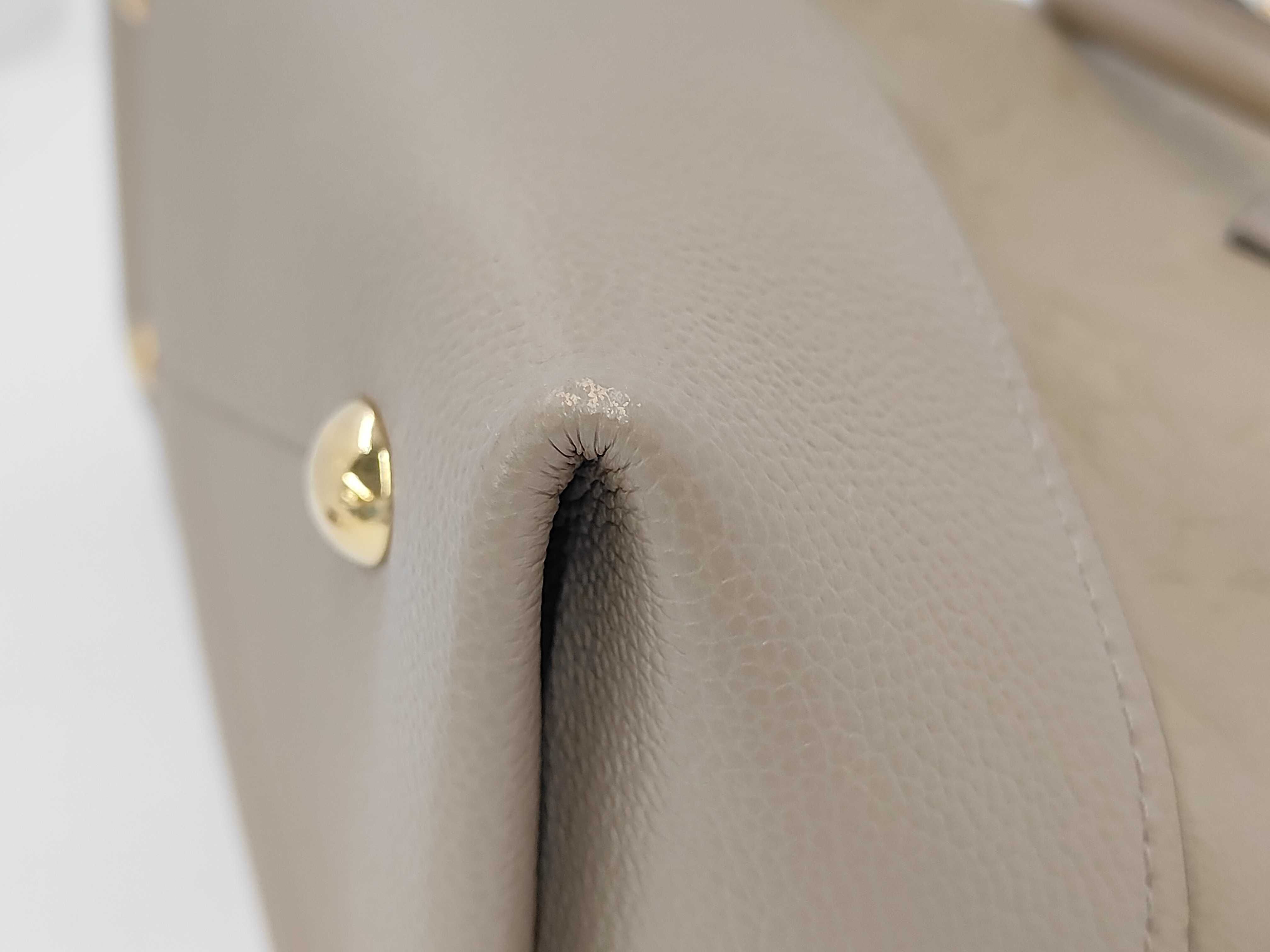 Monogram Empreinte Alma PM Cream Handbag — view 4