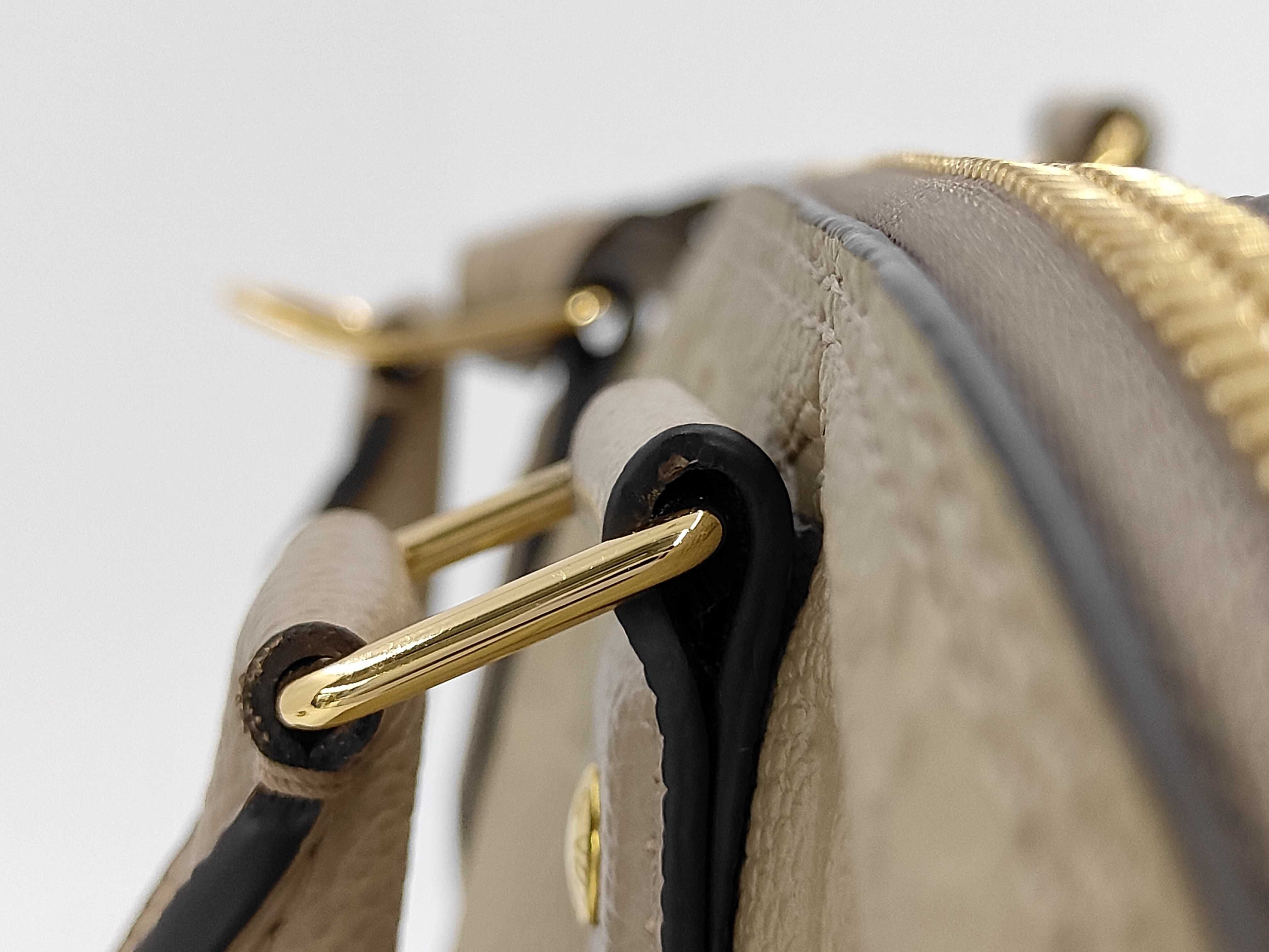 Monogram Empreinte Alma PM Cream Handbag — view 7