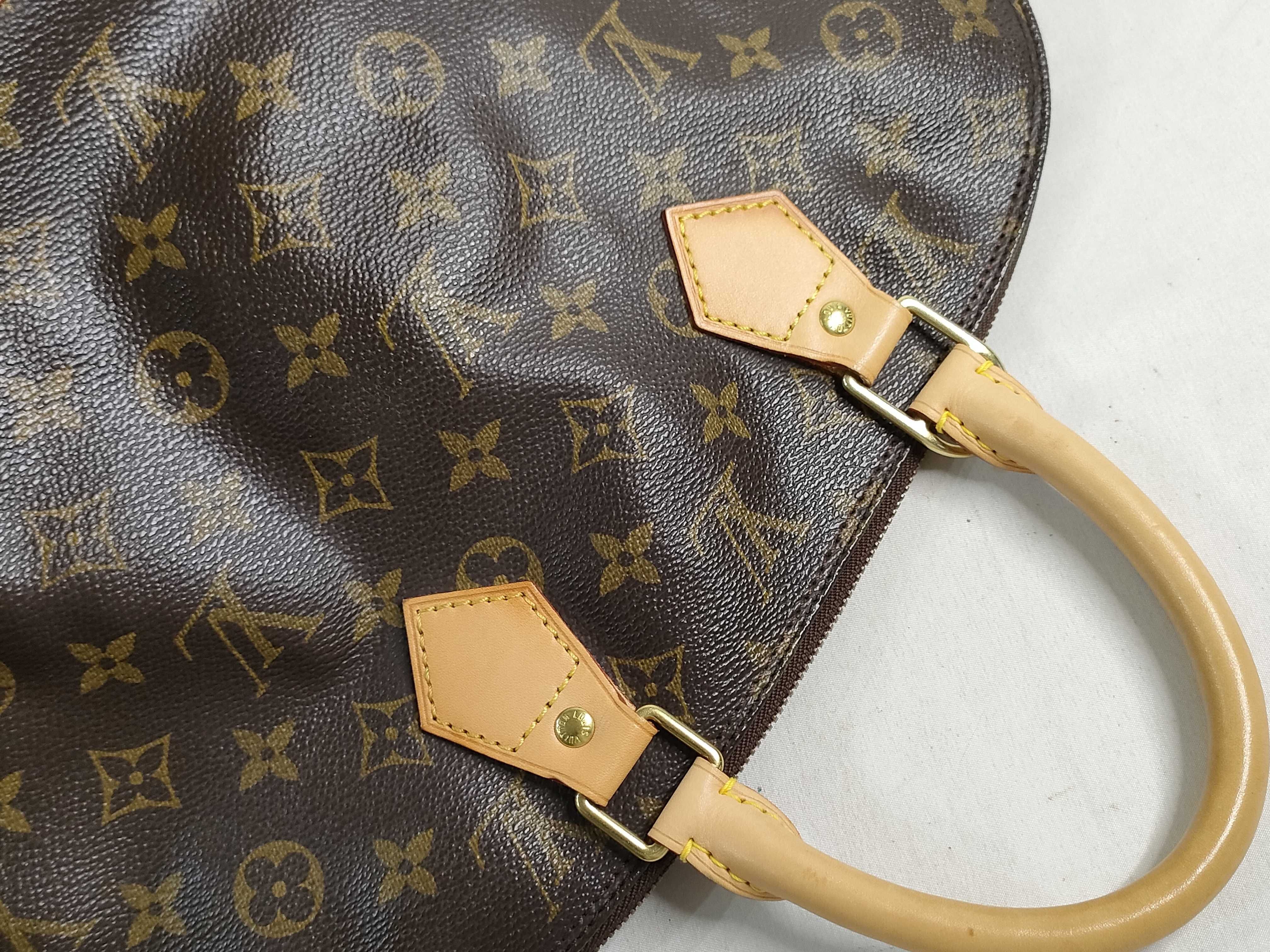 Monogram Alma M51130 VI0973 Handbag — view 14