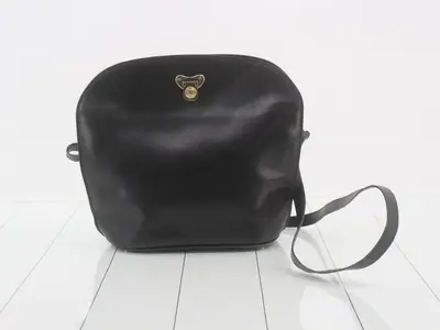 Medallion Leather Vintage Janus Shoulder Bag
