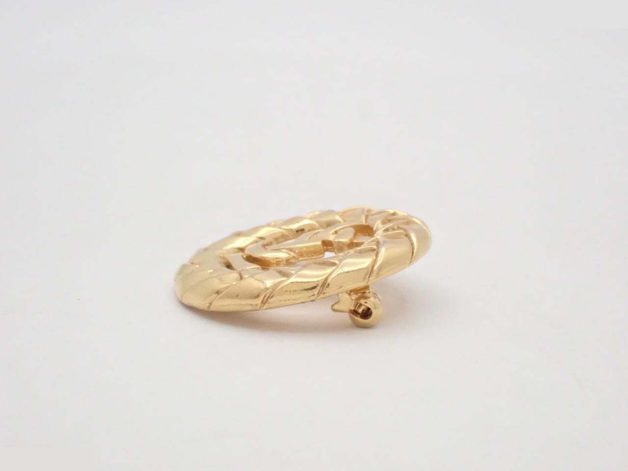 Gold logo brooch — view 3
