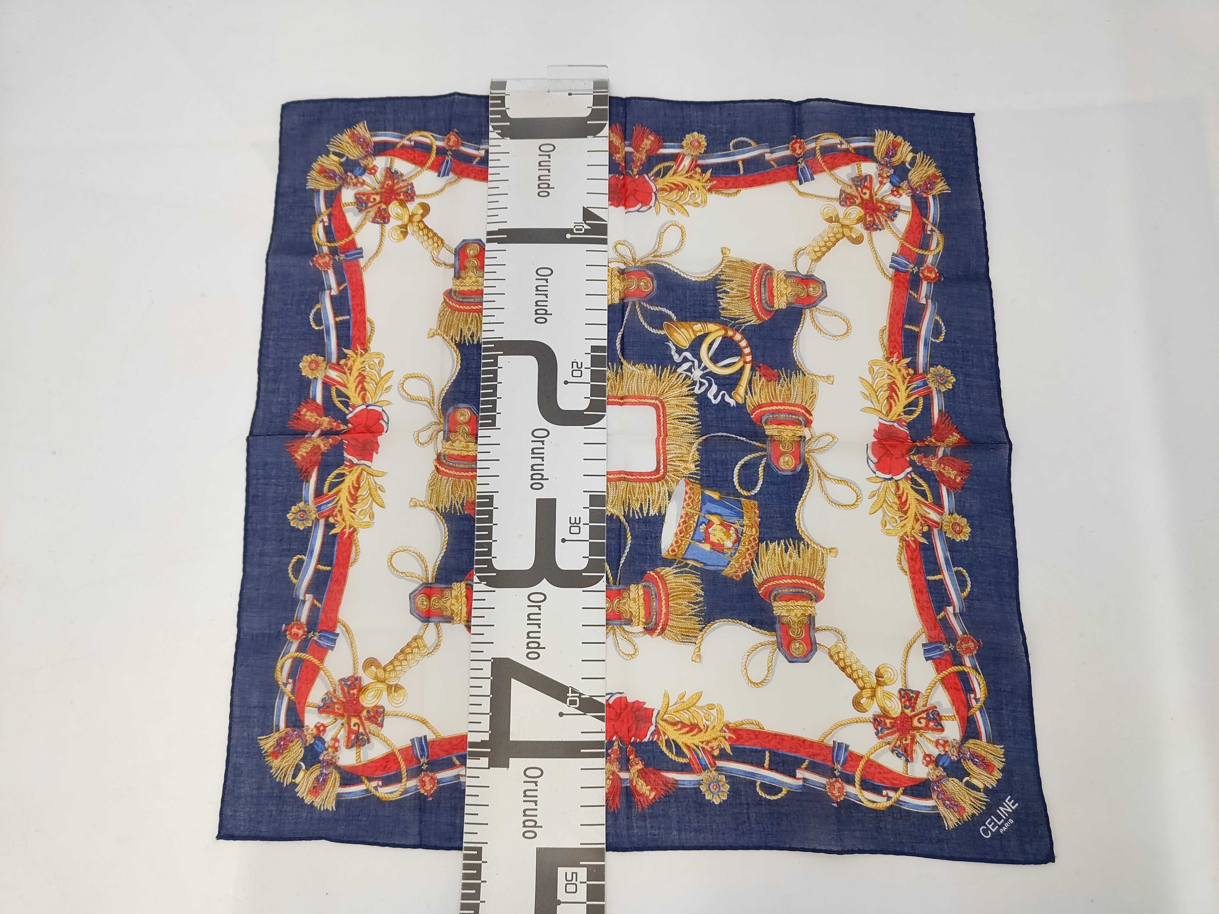 handkerchief scarf with drum-shaped fringe and tassel, and other accessories. — view 2