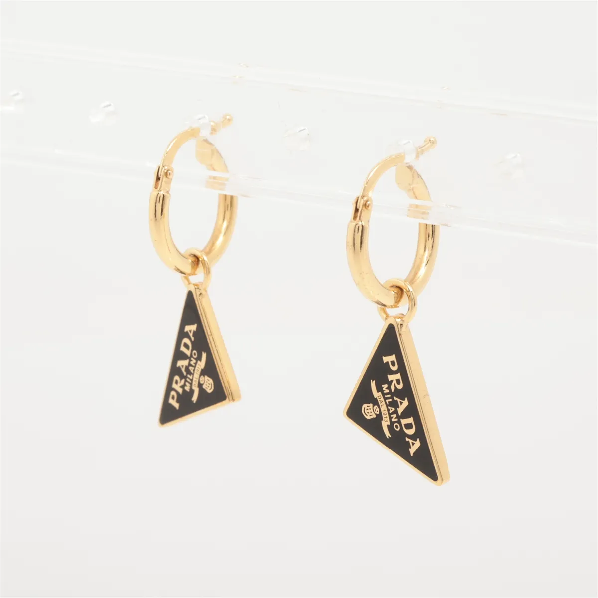 Triangle Logo Earrings (Pair) GP Gold x Black. Shows — view 3
