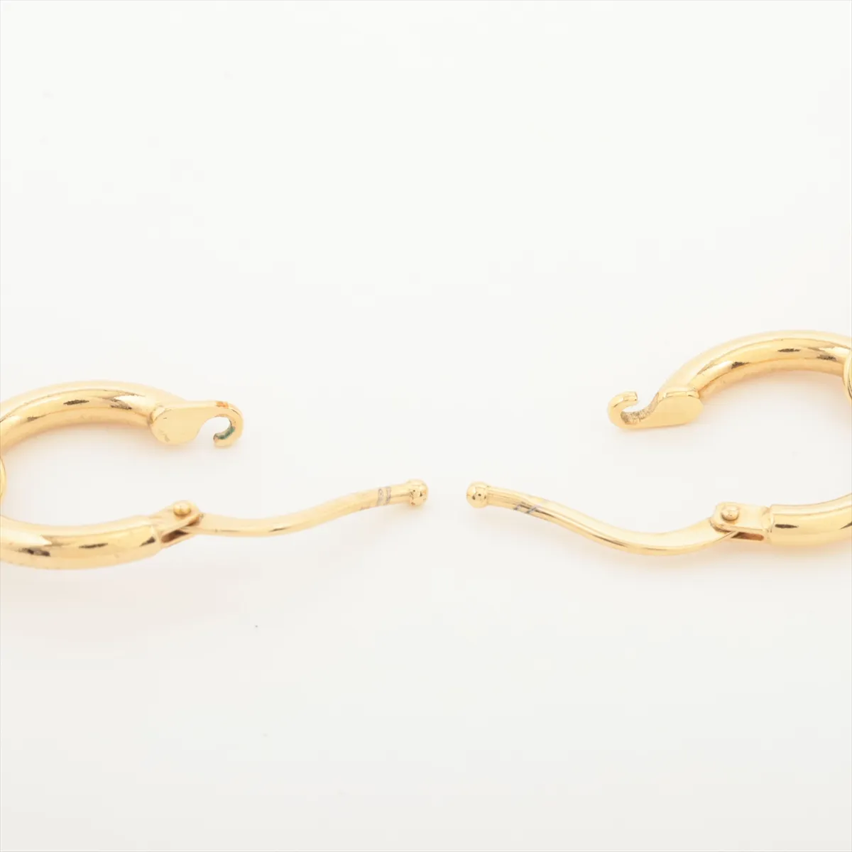 Triangle Logo Earrings (Pair) GP Gold x Black. Shows — view 4