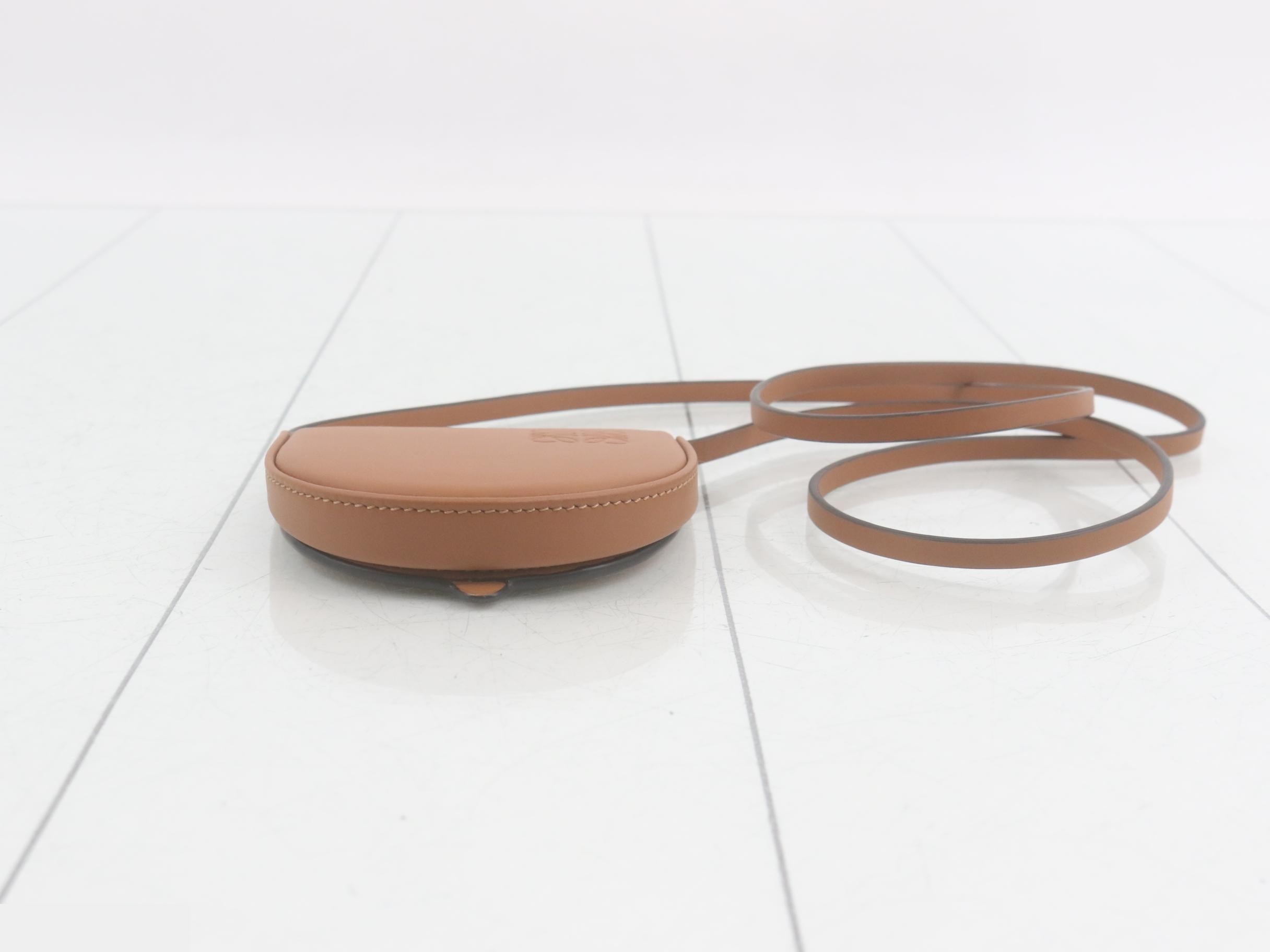 Other lines: Bags & Pouches, Heel Pouch, Mini, Leather, Brown — view 3