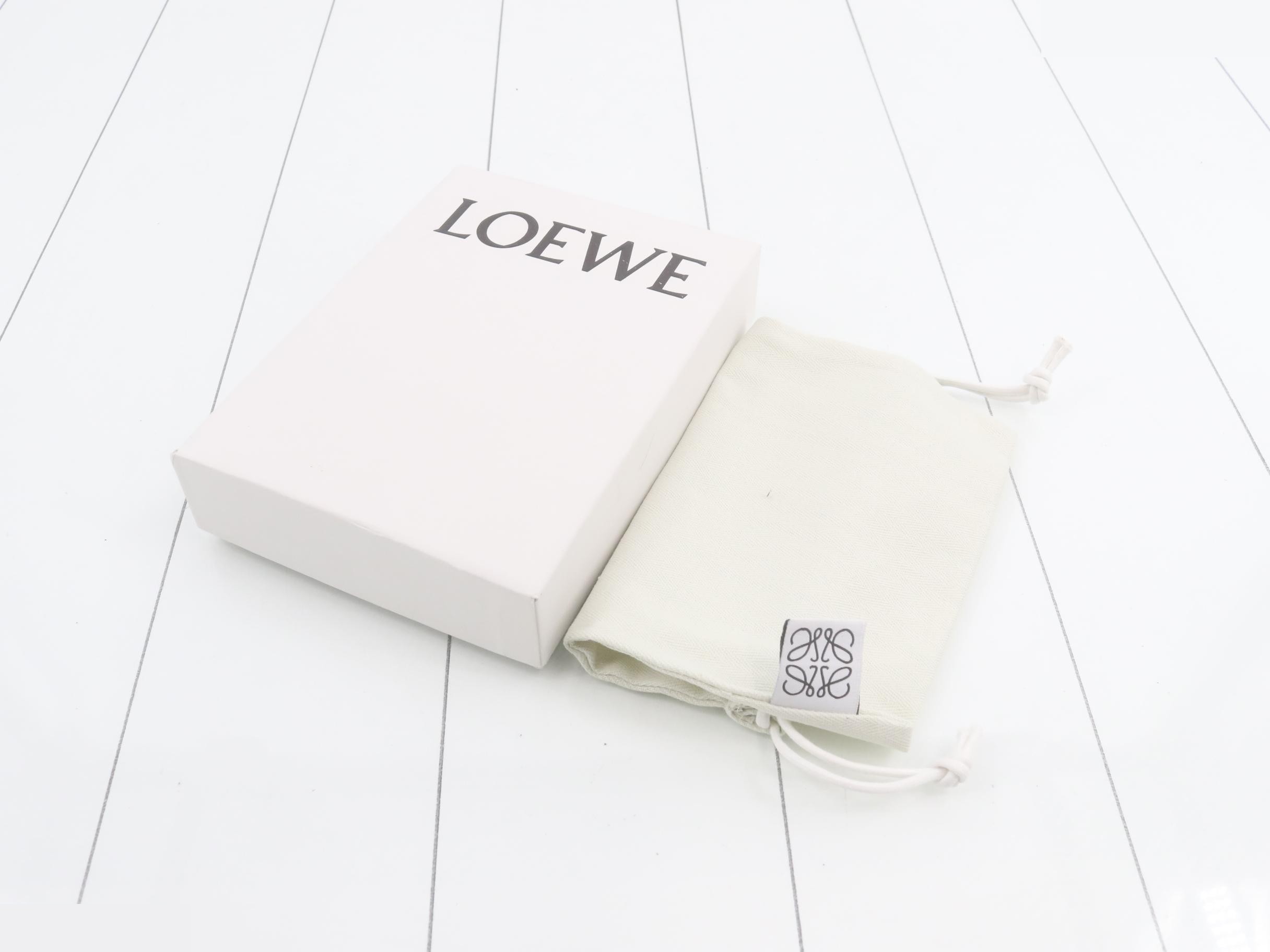 Other lines: Bags & Pouches, Heel Pouch, Mini, Leather, Brown — view 5