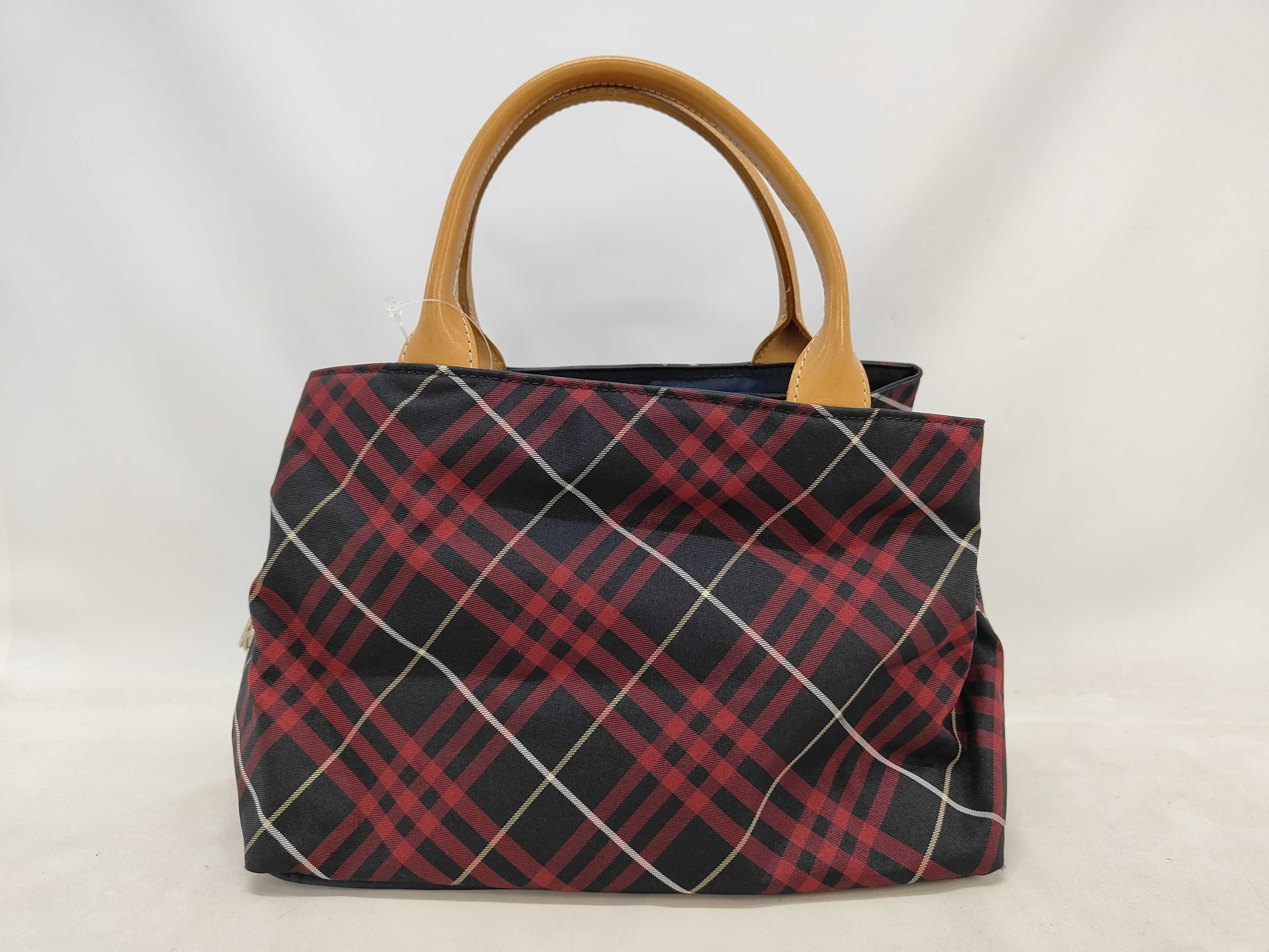 check hand handbag