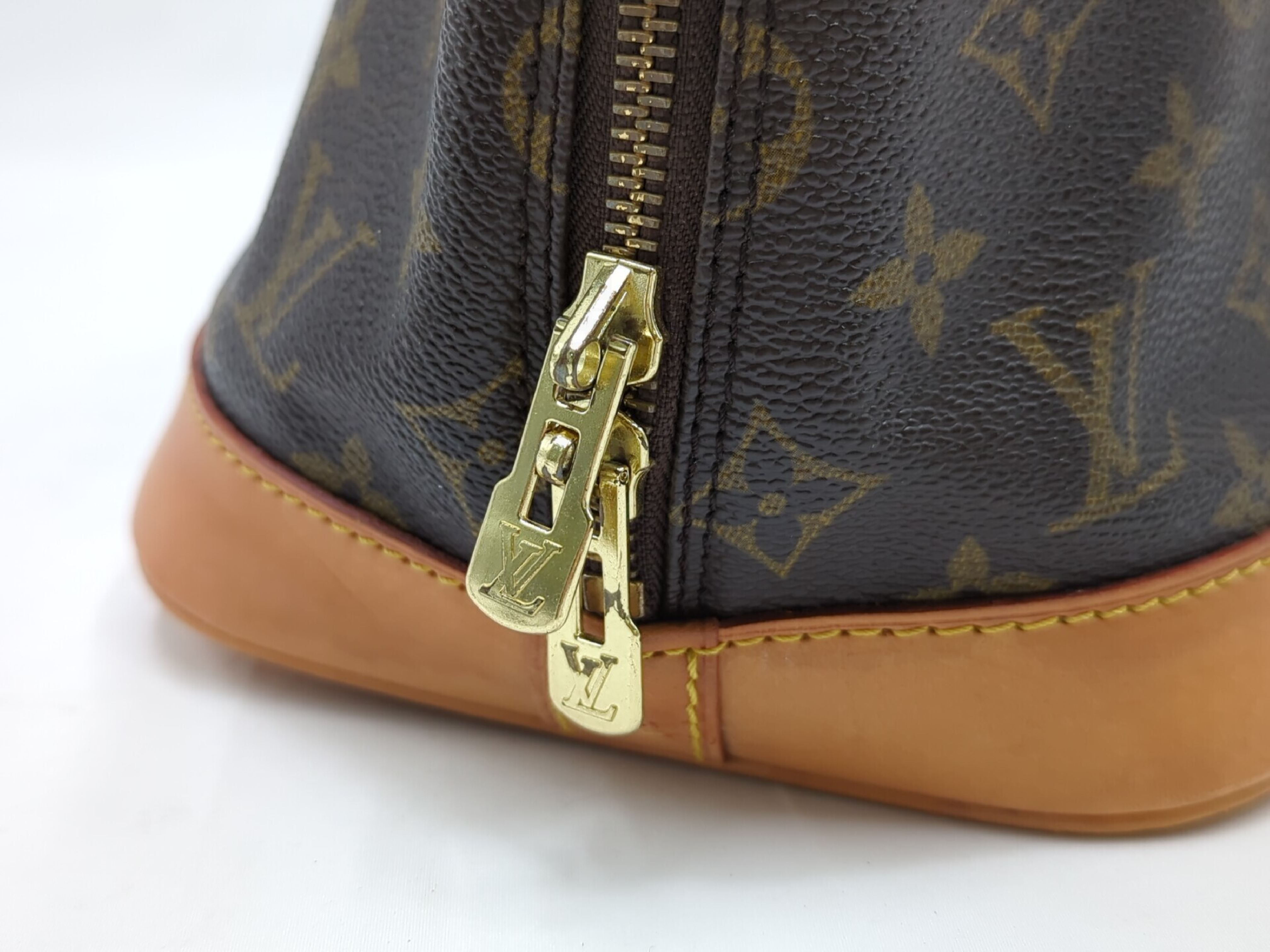 M51130 Monogram Alma Handbag — view 9