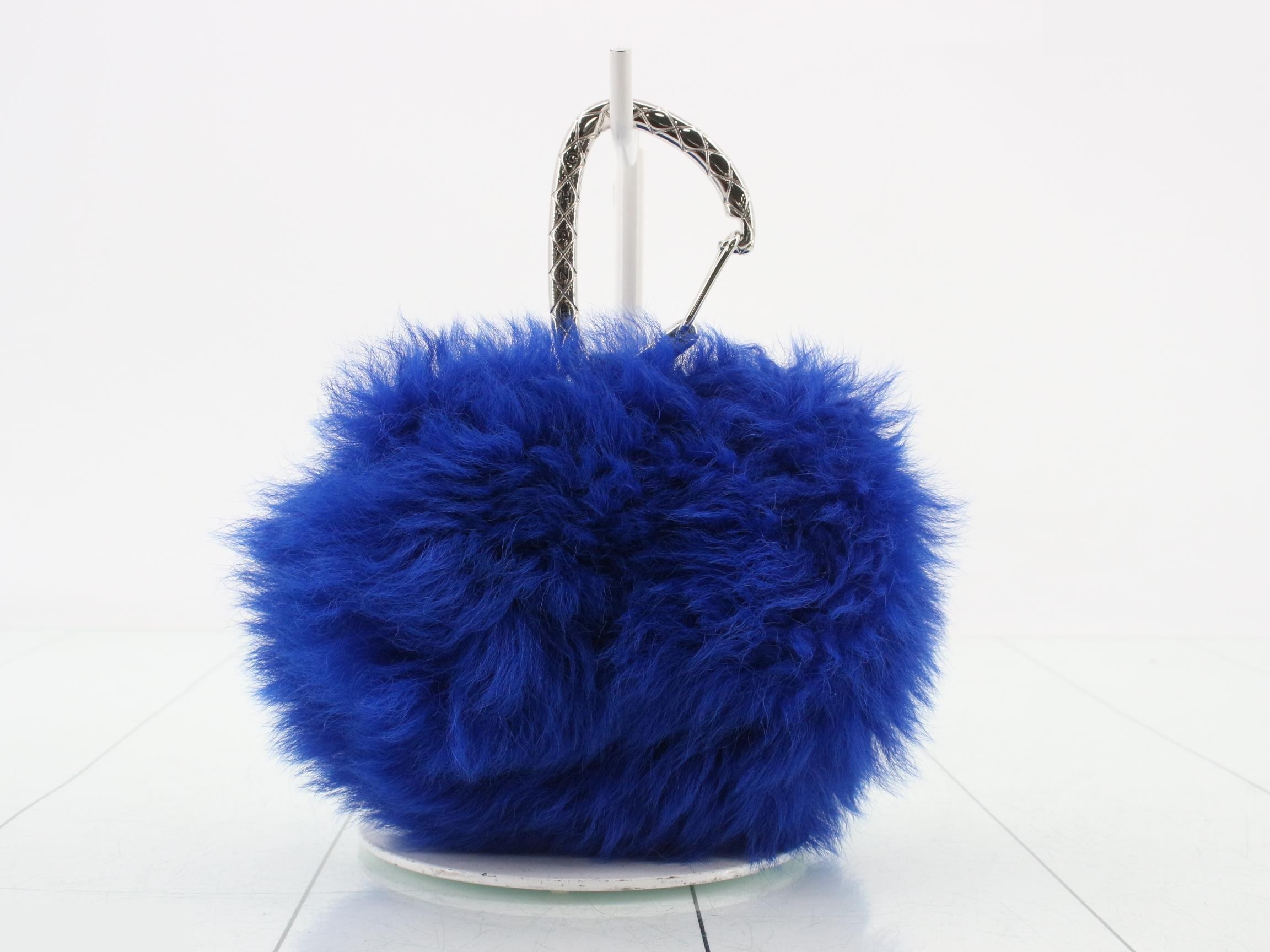 Shearling pouch, blue tones