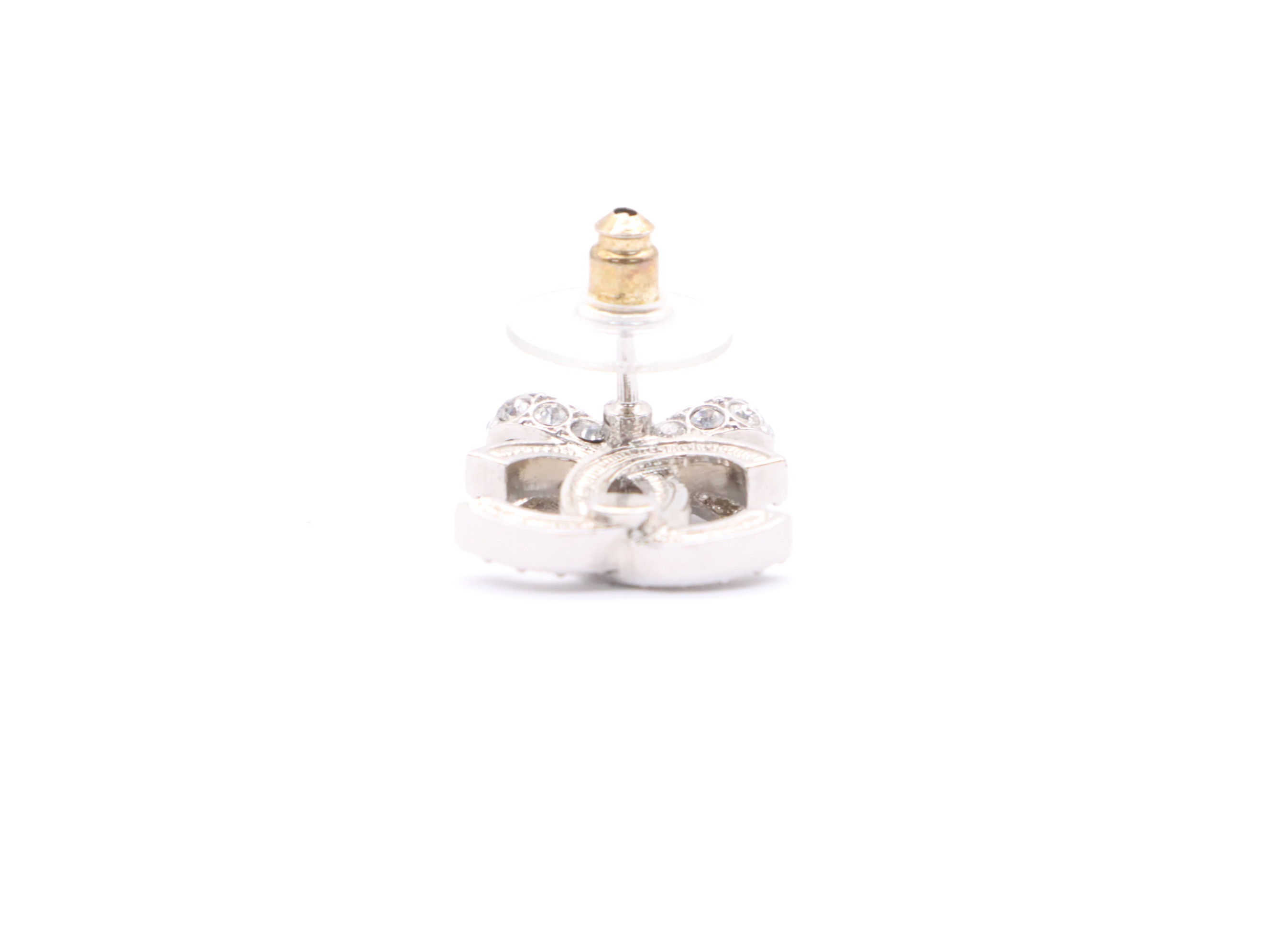 Metal and rhinestone earrings with a Coco Mark ribbon design, silver. — view 4