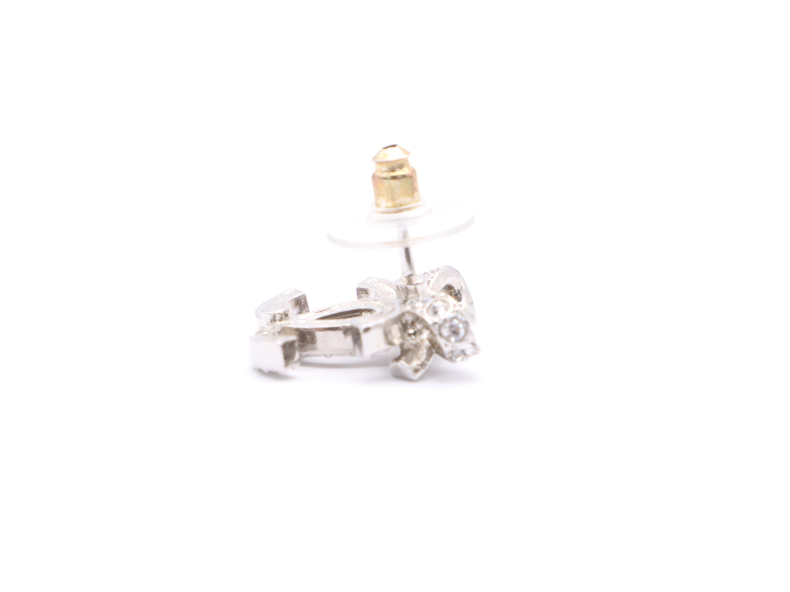 Metal and rhinestone earrings with a Coco Mark ribbon design, silver. — view 5