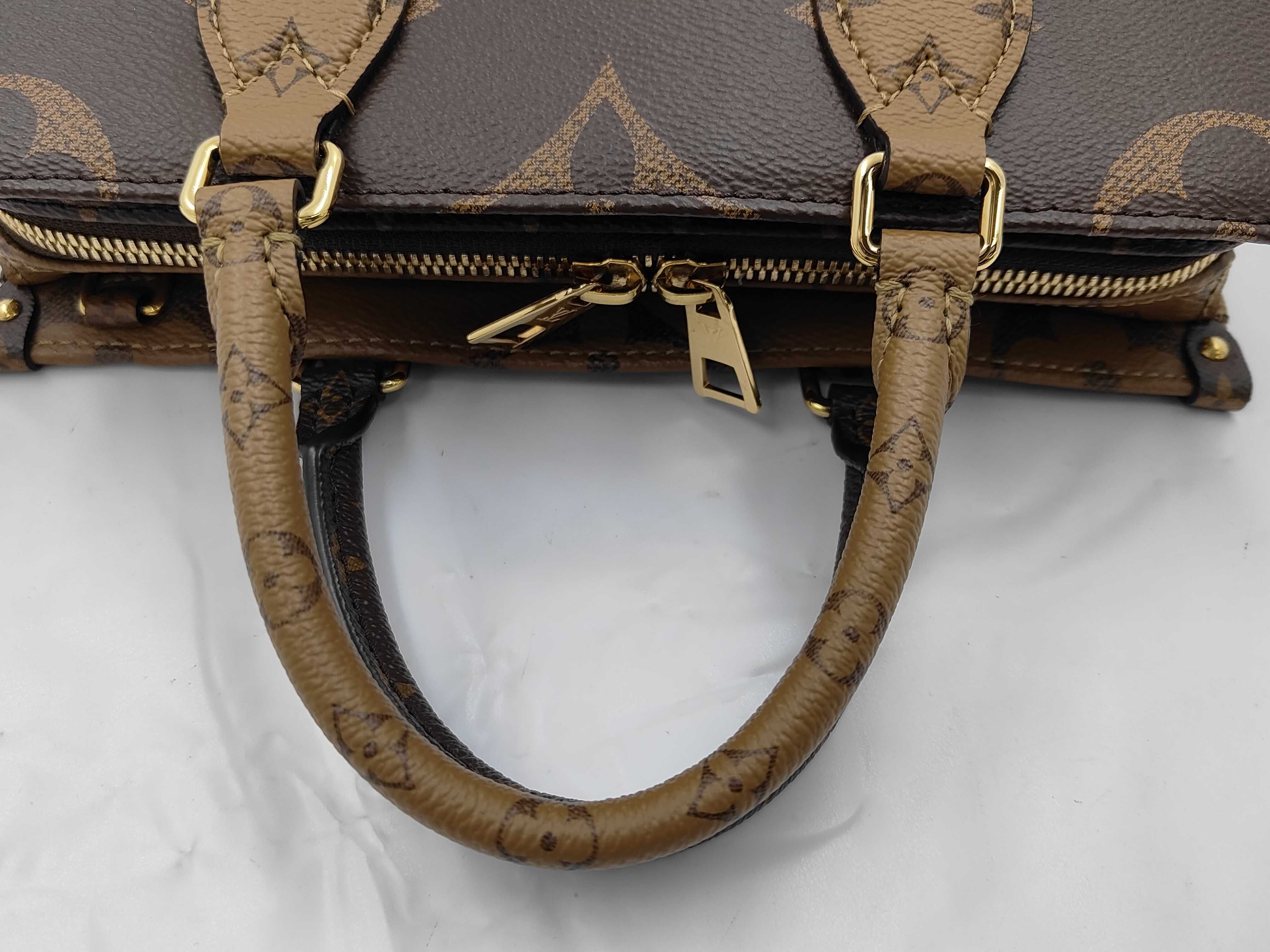 Monogram Giant Reverse OnTheGo EW Handbag M46653 RFID Shoulder Strap — view 3