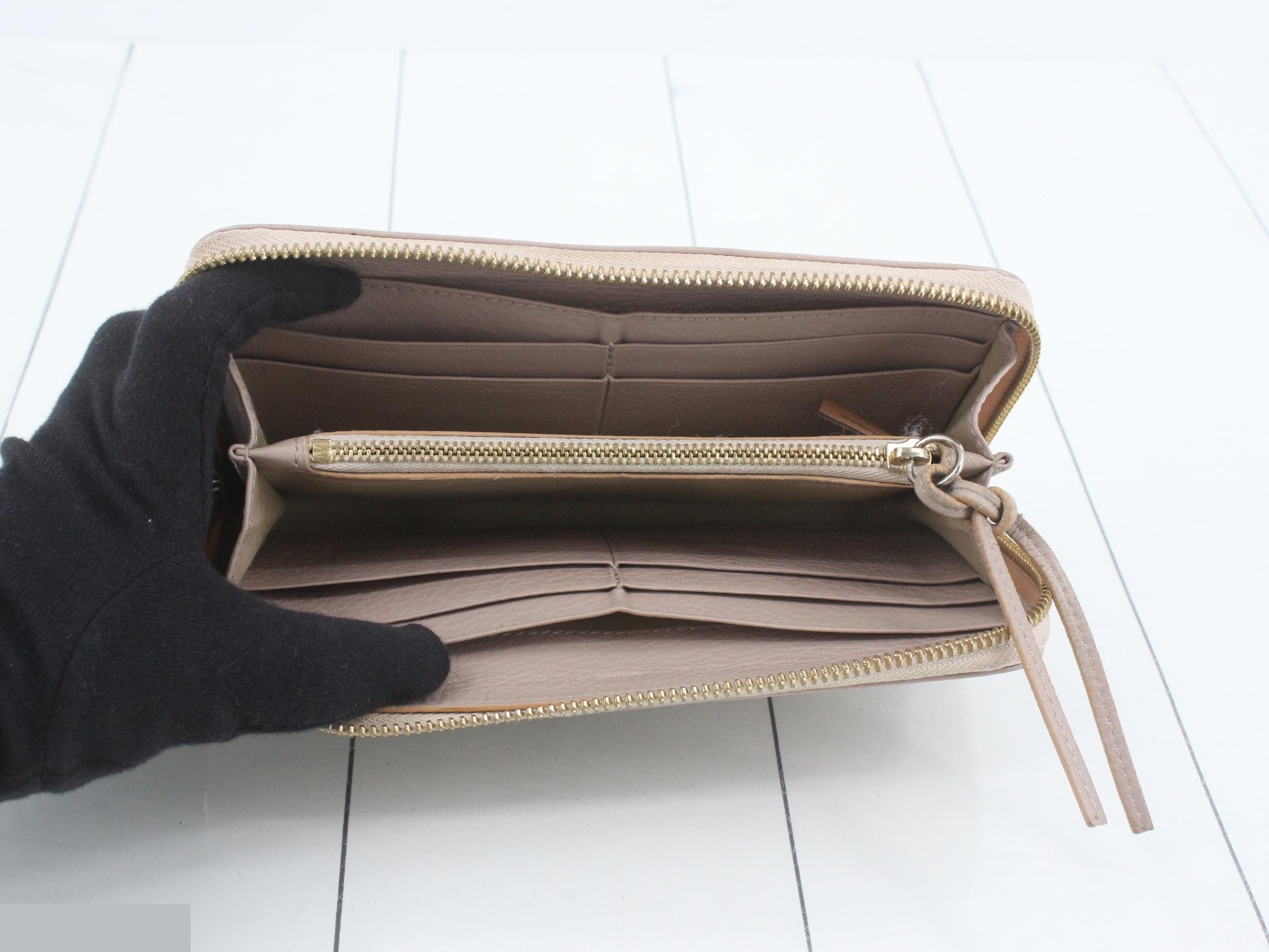 Other lines: Bags & Wallets, Round Zipper Wallet, Pink — view 4