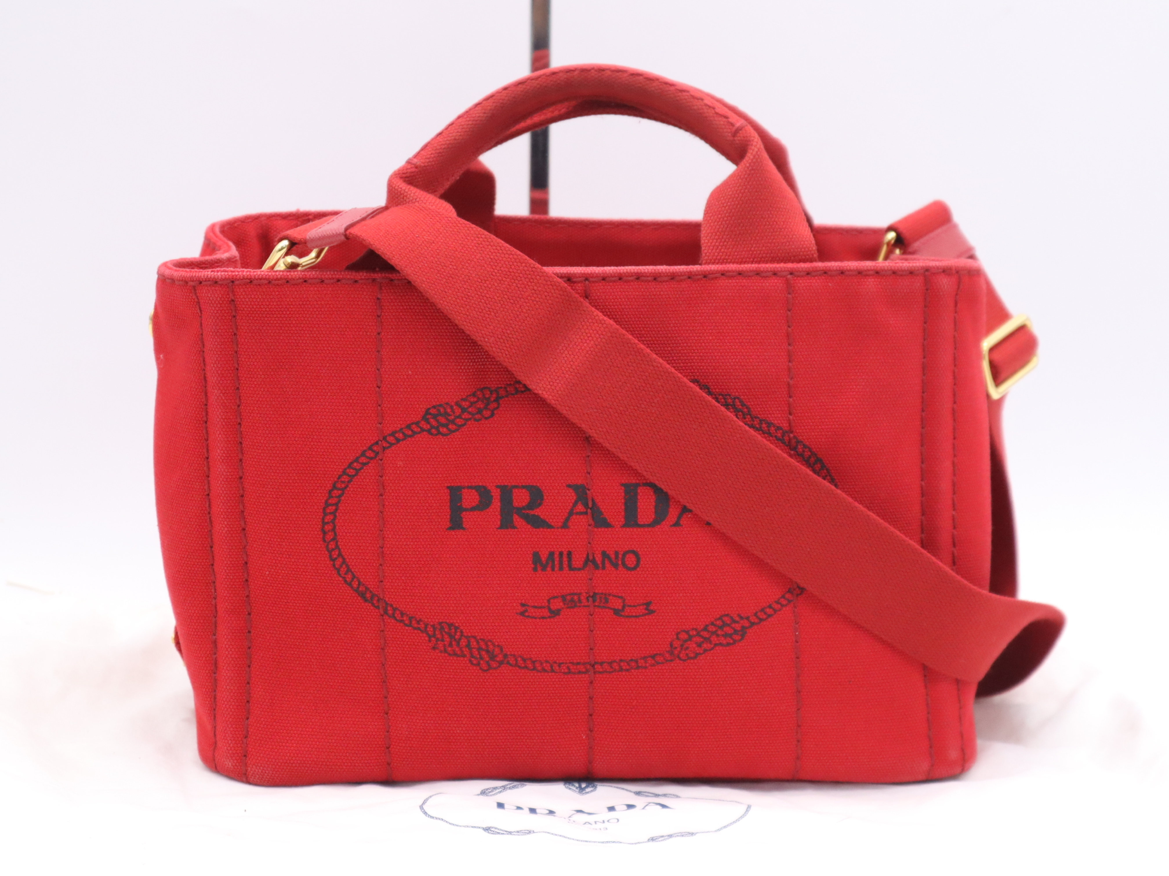 Canvas Canapa 2-Way Handbag, Red with Gold Hardware, Shoulder Strap, and Dust Bag.