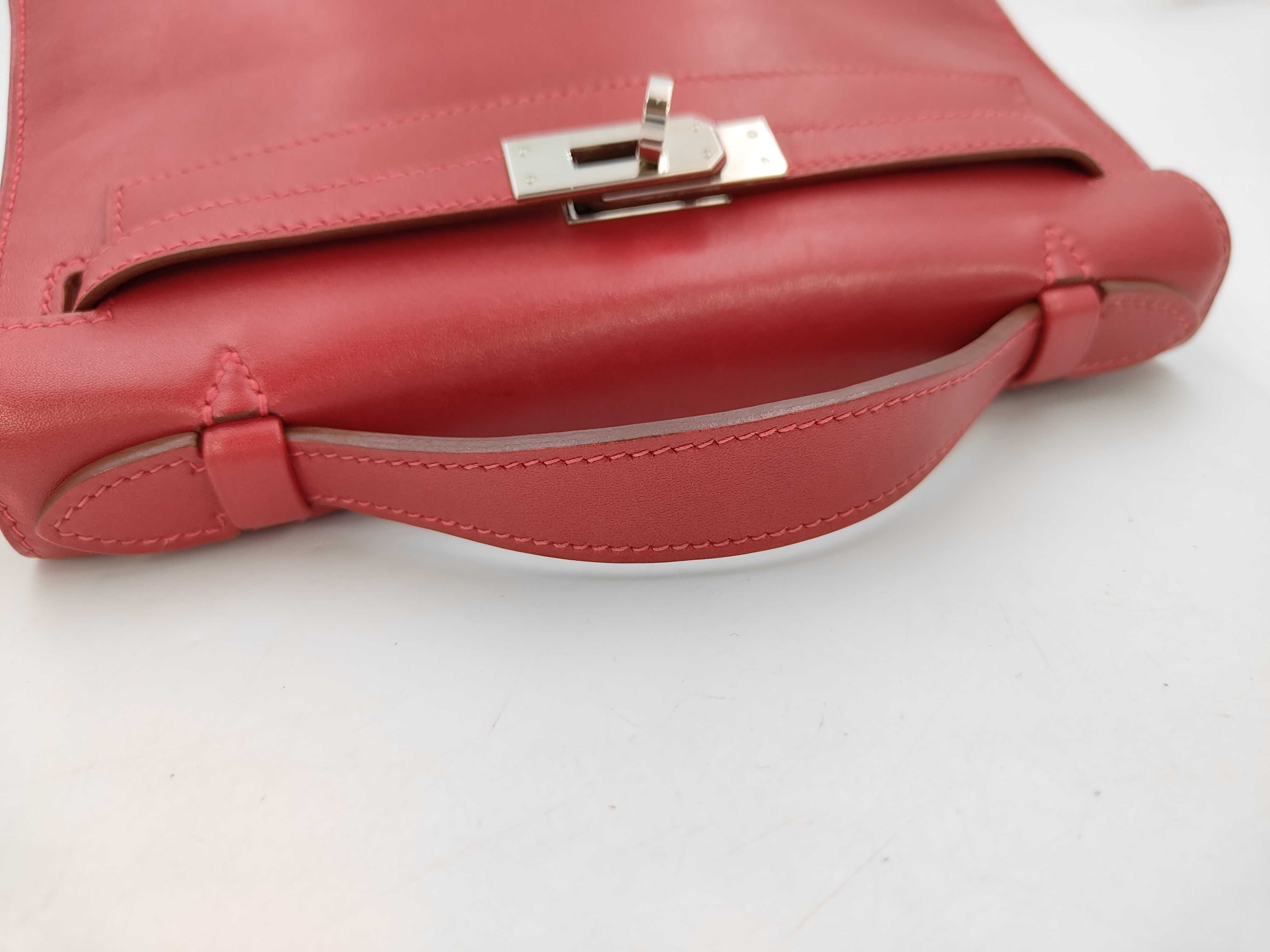 Pochette Kelly handbag, ruby, silver hardware, Veau Swift leather. — view 4